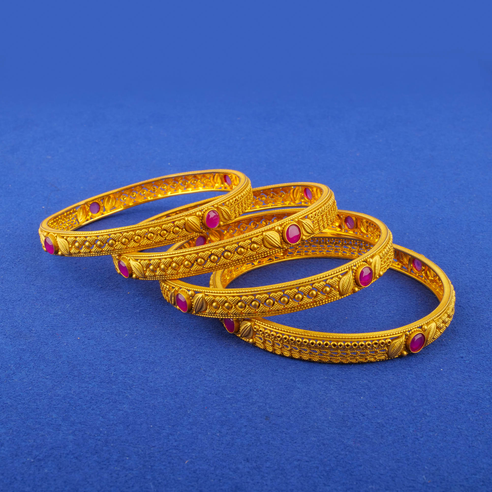 Twenty-Two Karat Gold 'Antique' Bangles