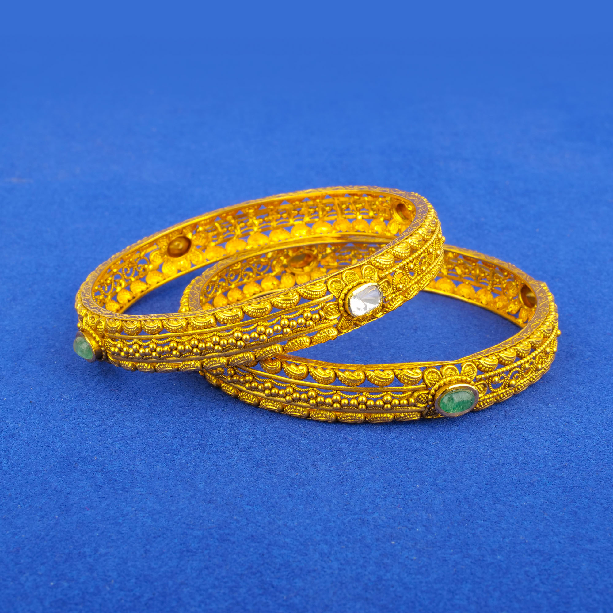 Twenty-Two Karat Gold 'Antique' Bangles