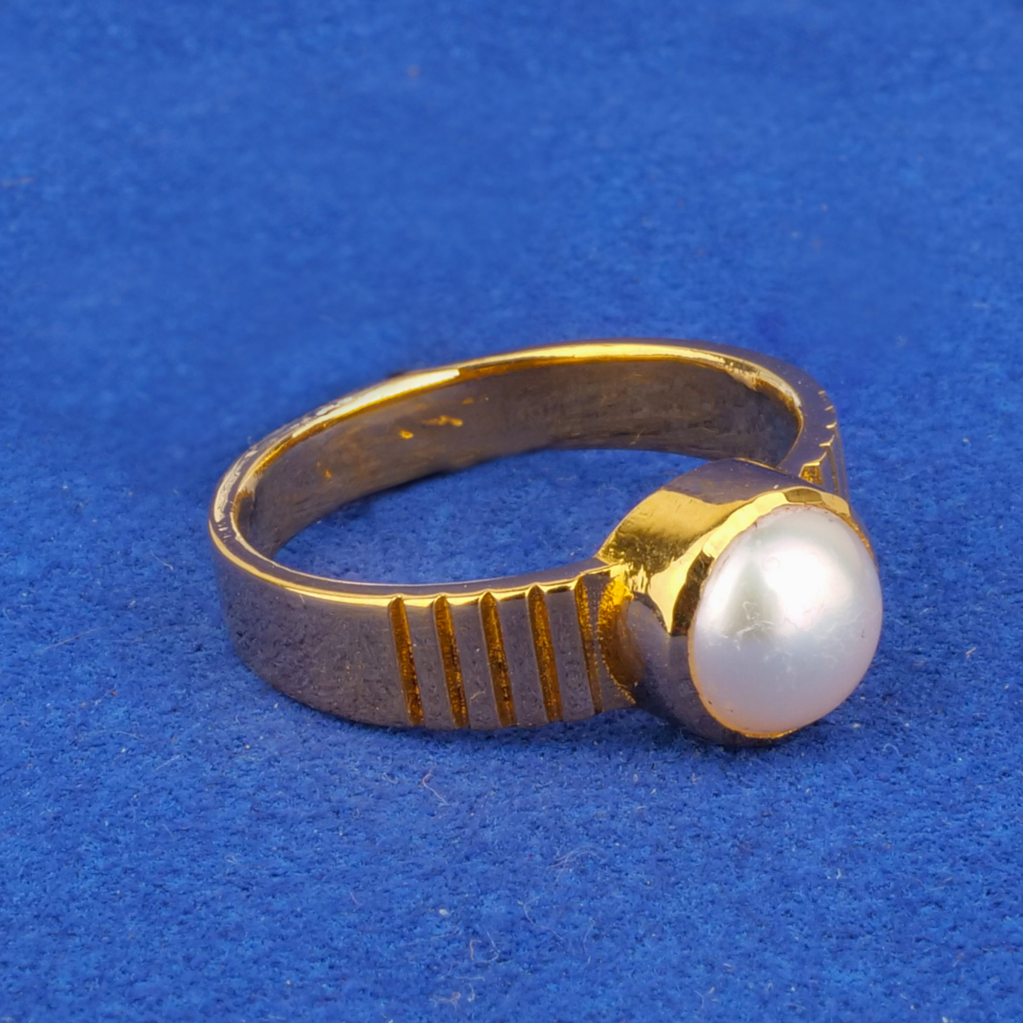 Twenty-Two Karat Gold South Sea Pearl Astrological Ring