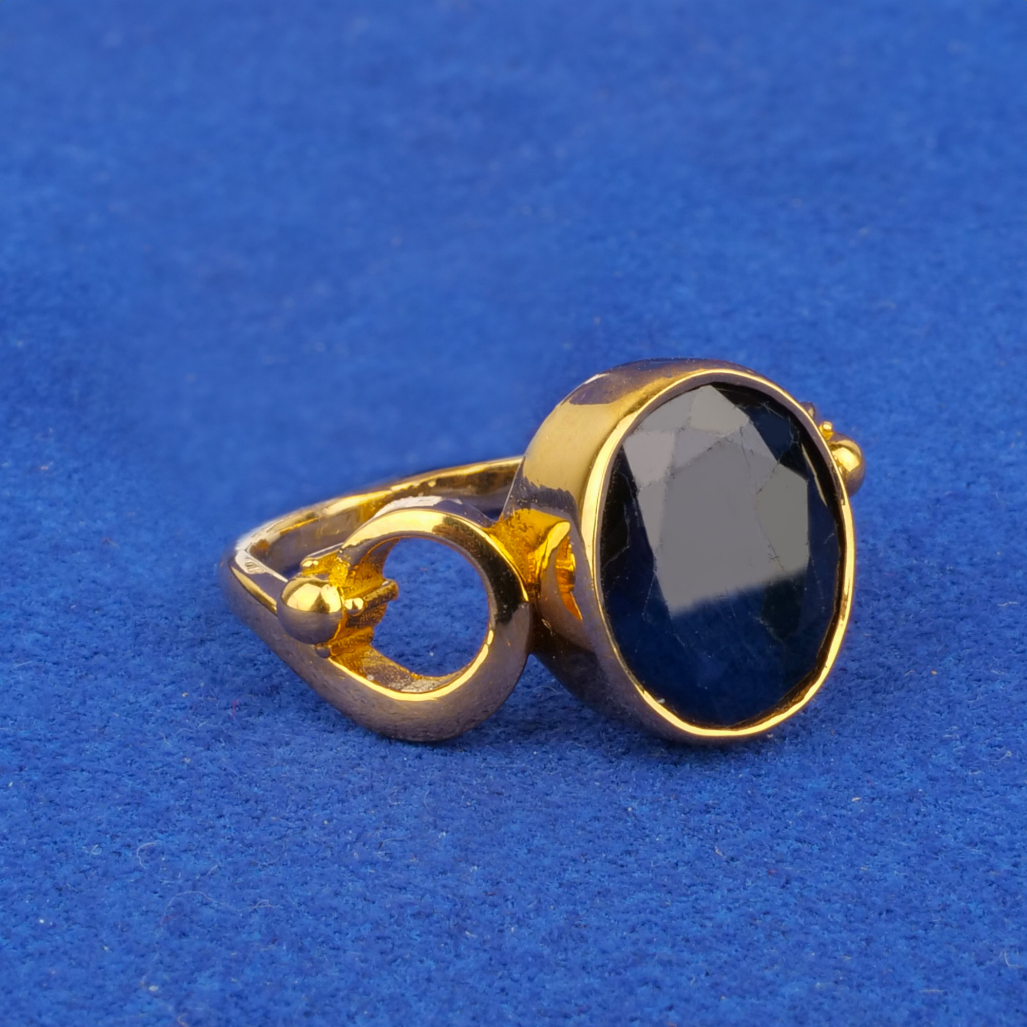 Twenty-Two Karat Gold Sapphire Astrological Ring