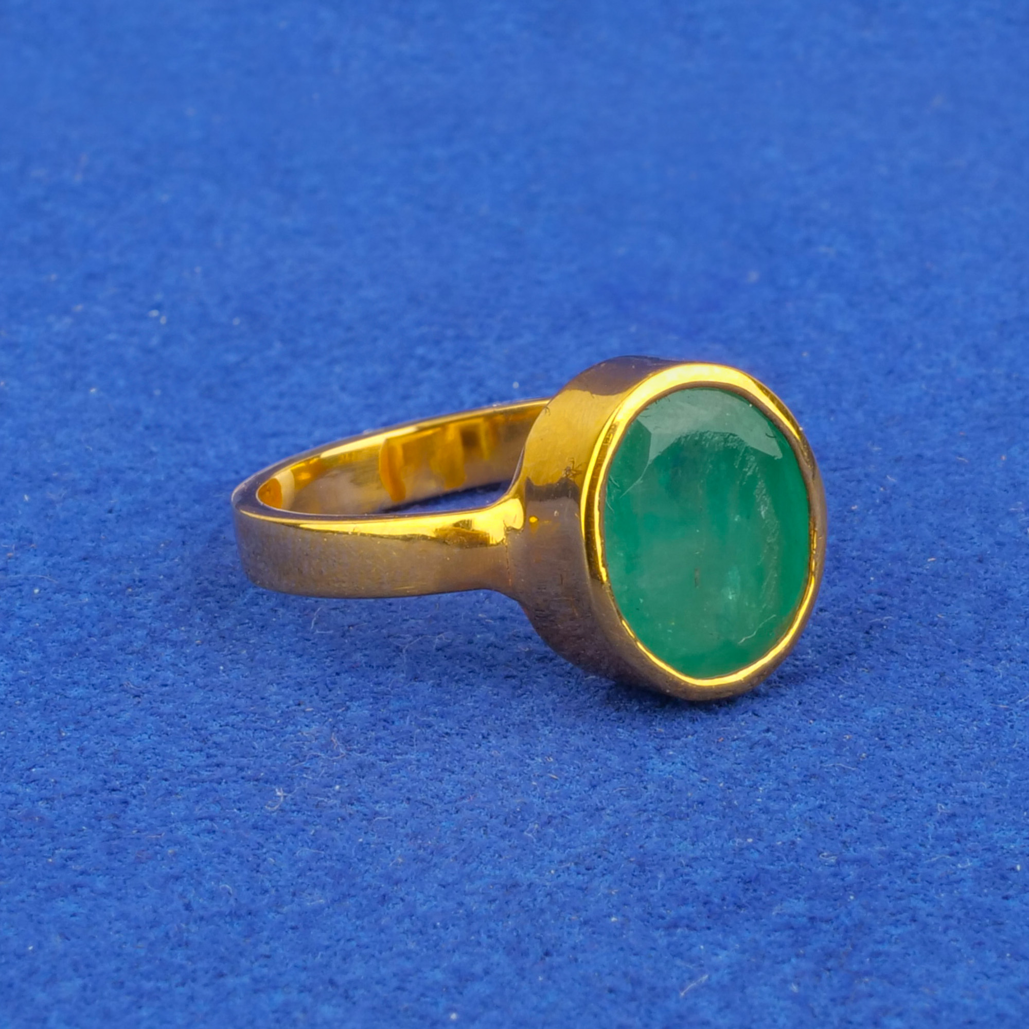 Twenty-Two Karat Gold Emerald Astrological Ring