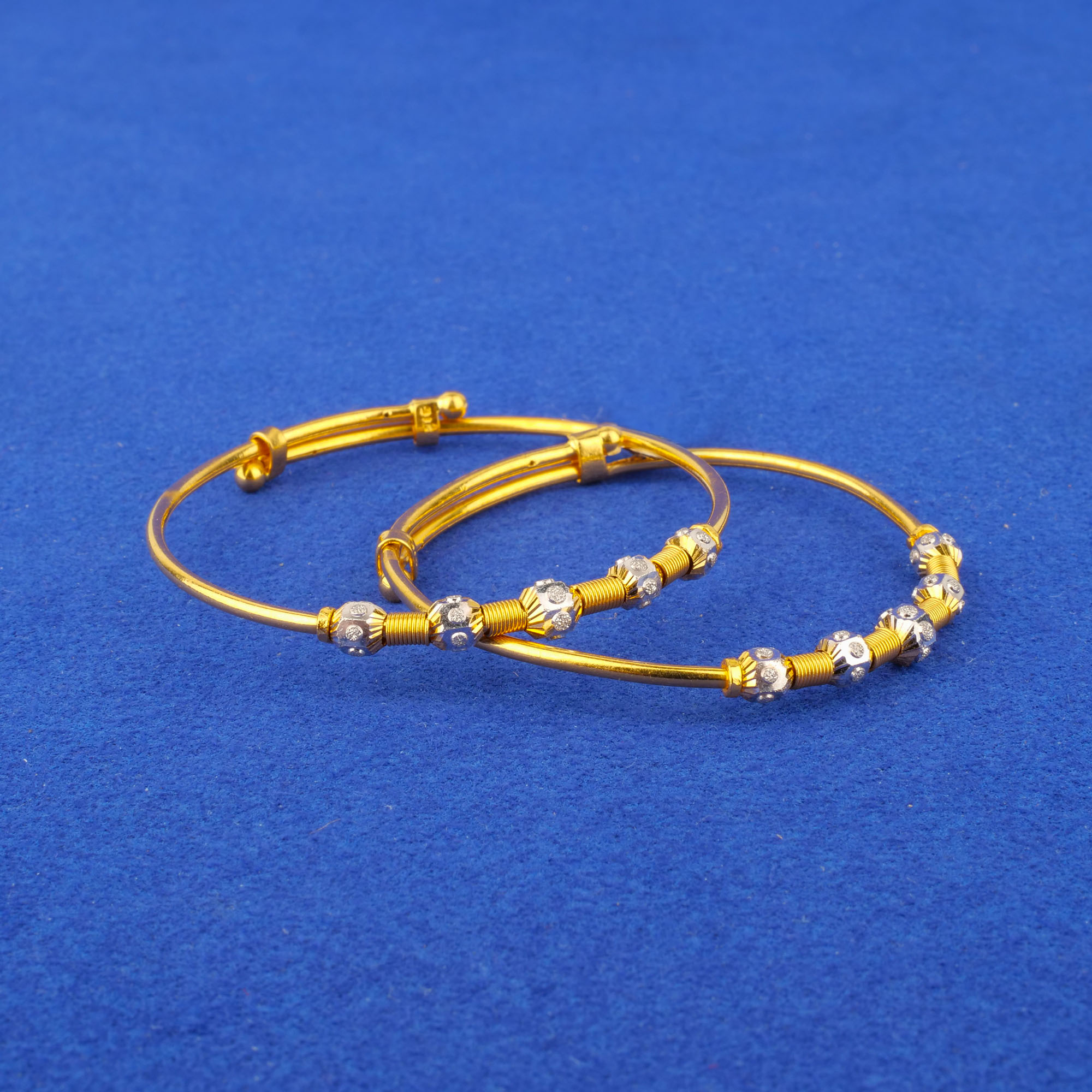 Twenty-Two Karat Baby Two-Tone Gold 'Adjustable' Bangles