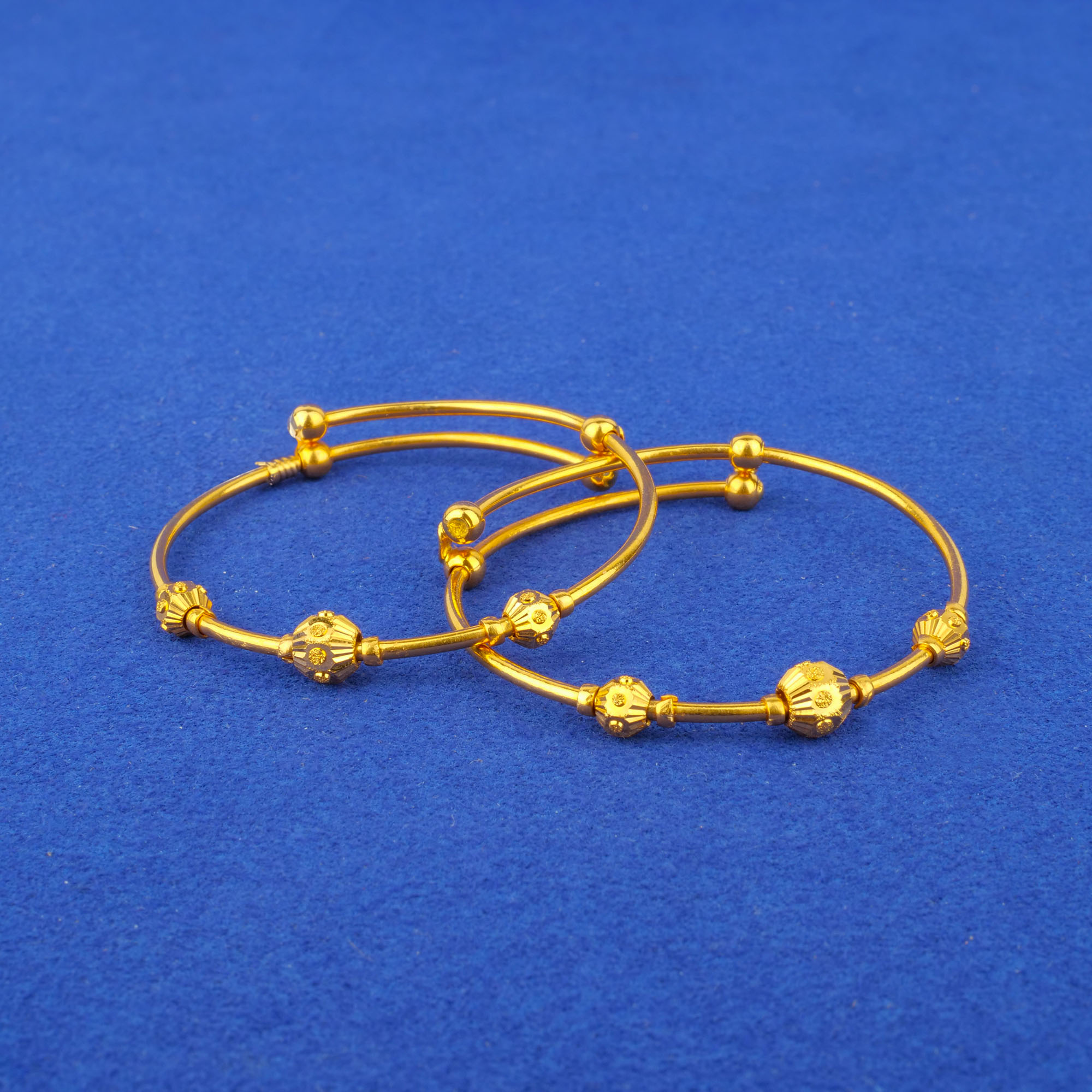 Twenty-Two Karat Baby Gold 'Adjustable' Bangles