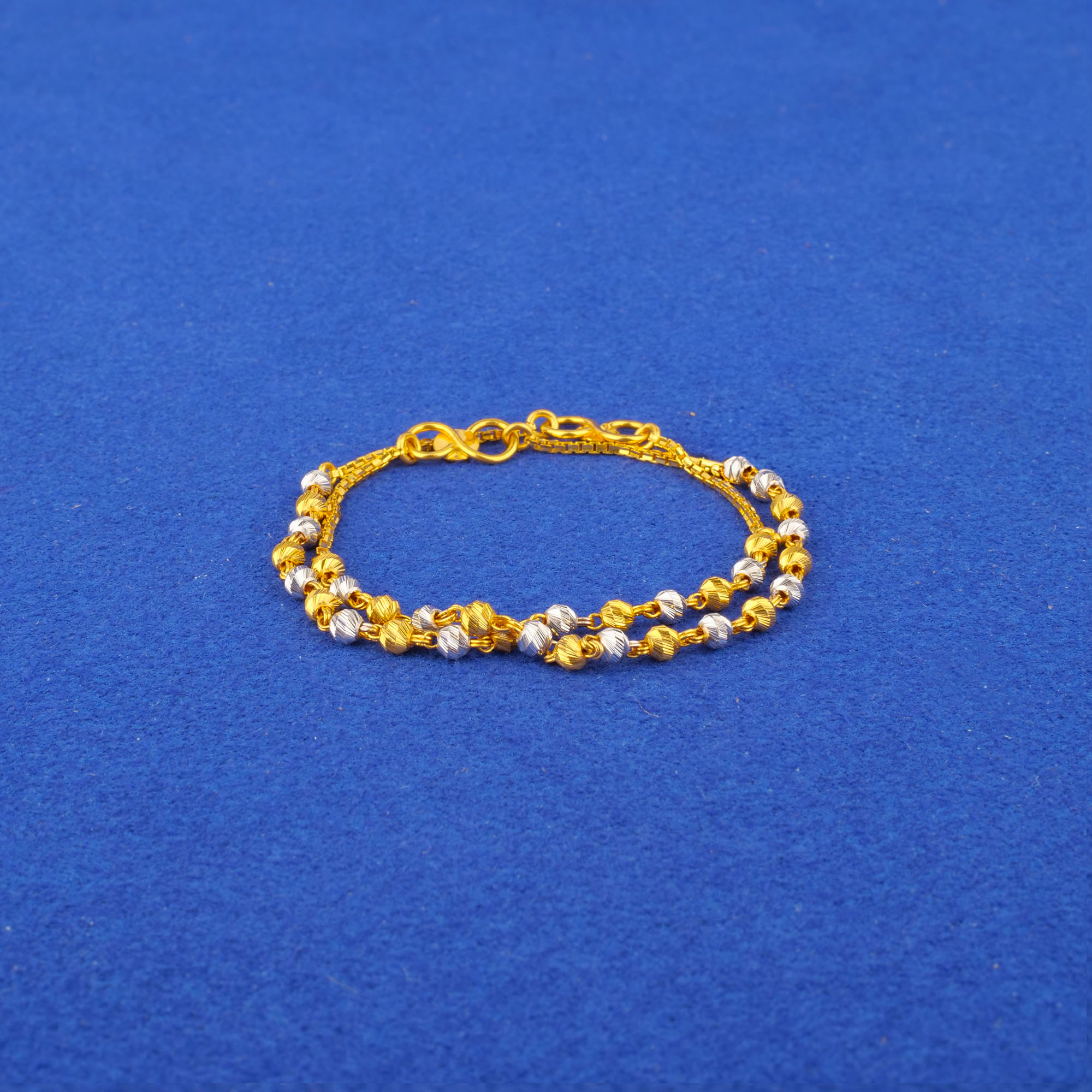 Twenty-Two Karat Baby Two-Tone Gold Bracelet Pair