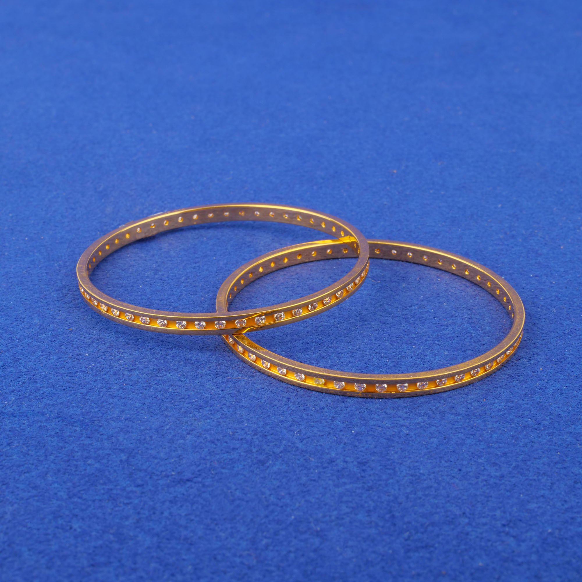 Twenty-Two Karat Baby Gold Cubic Zirconia Bangles