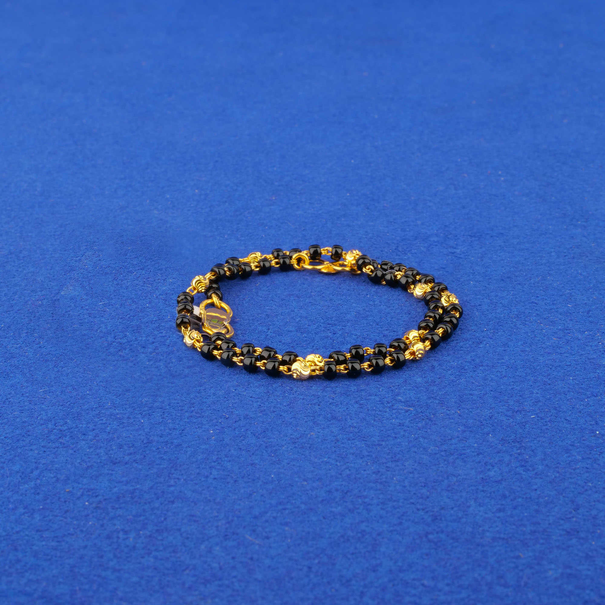 Twenty-Two Karat Baby Gold Blackbead Bracelet Pair
