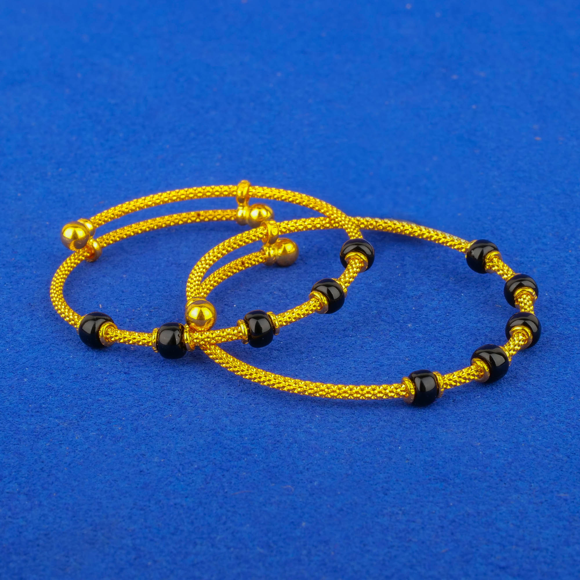 Twenty-Two Karat Baby Gold Blackbead 'Adjustable' Bangles