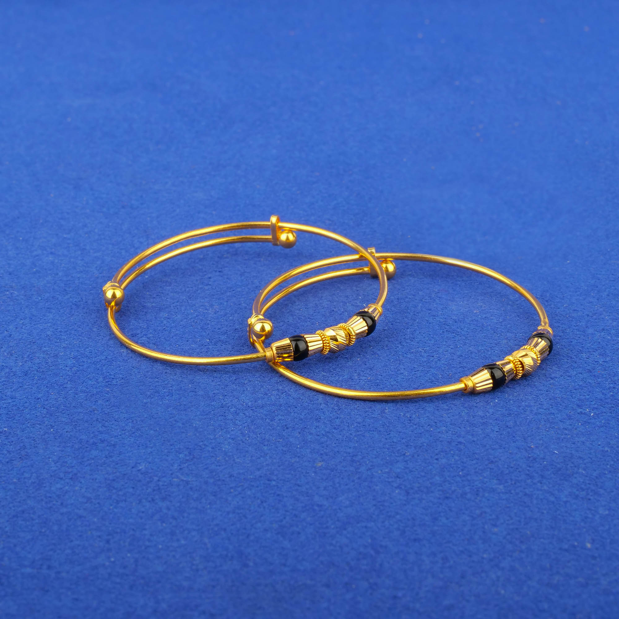 Twenty-Two Karat Baby Gold Blackbead 'Adjustable' Bangles
