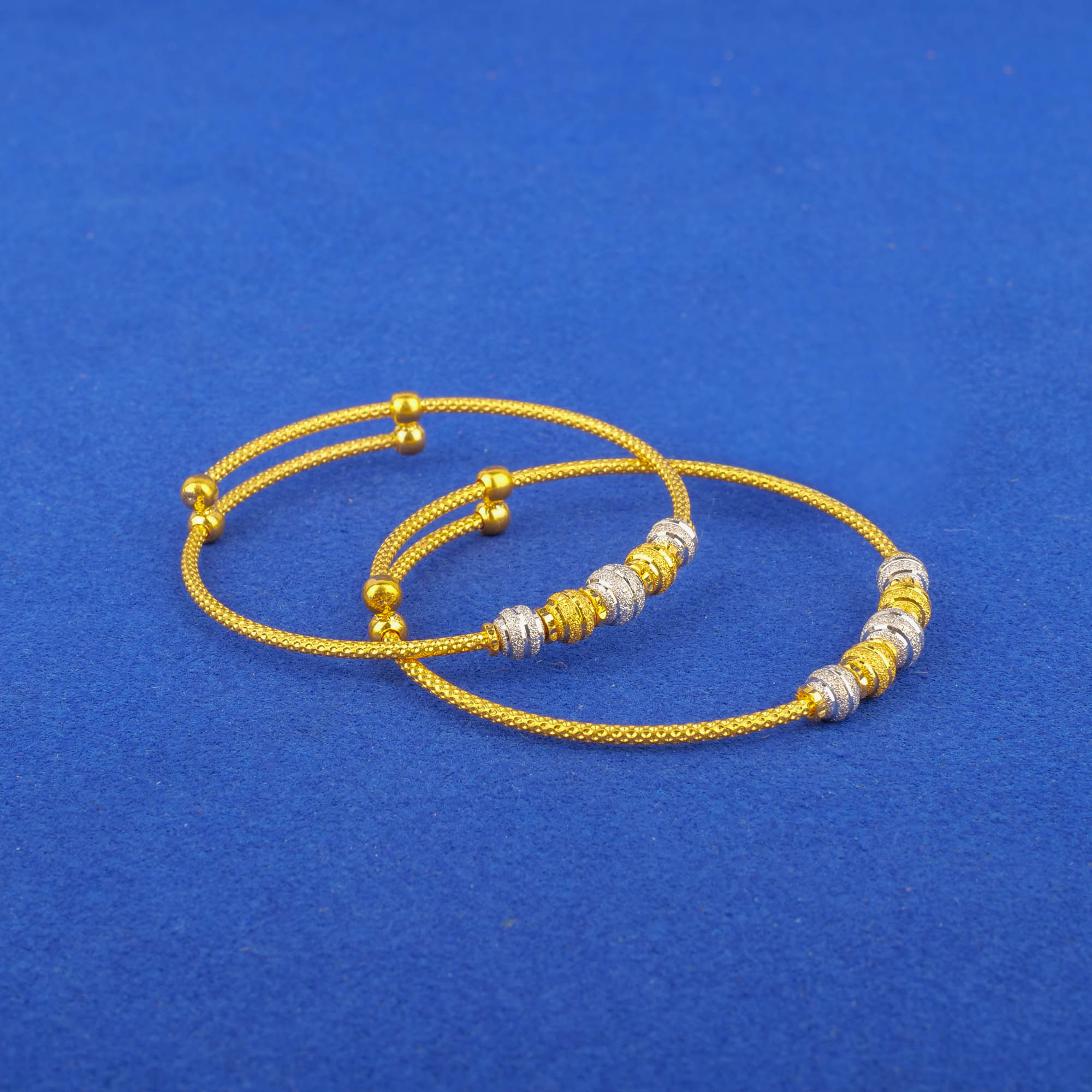 Twenty-Two Karat Baby Two-Tone Gold 'Adjustable' Bangles