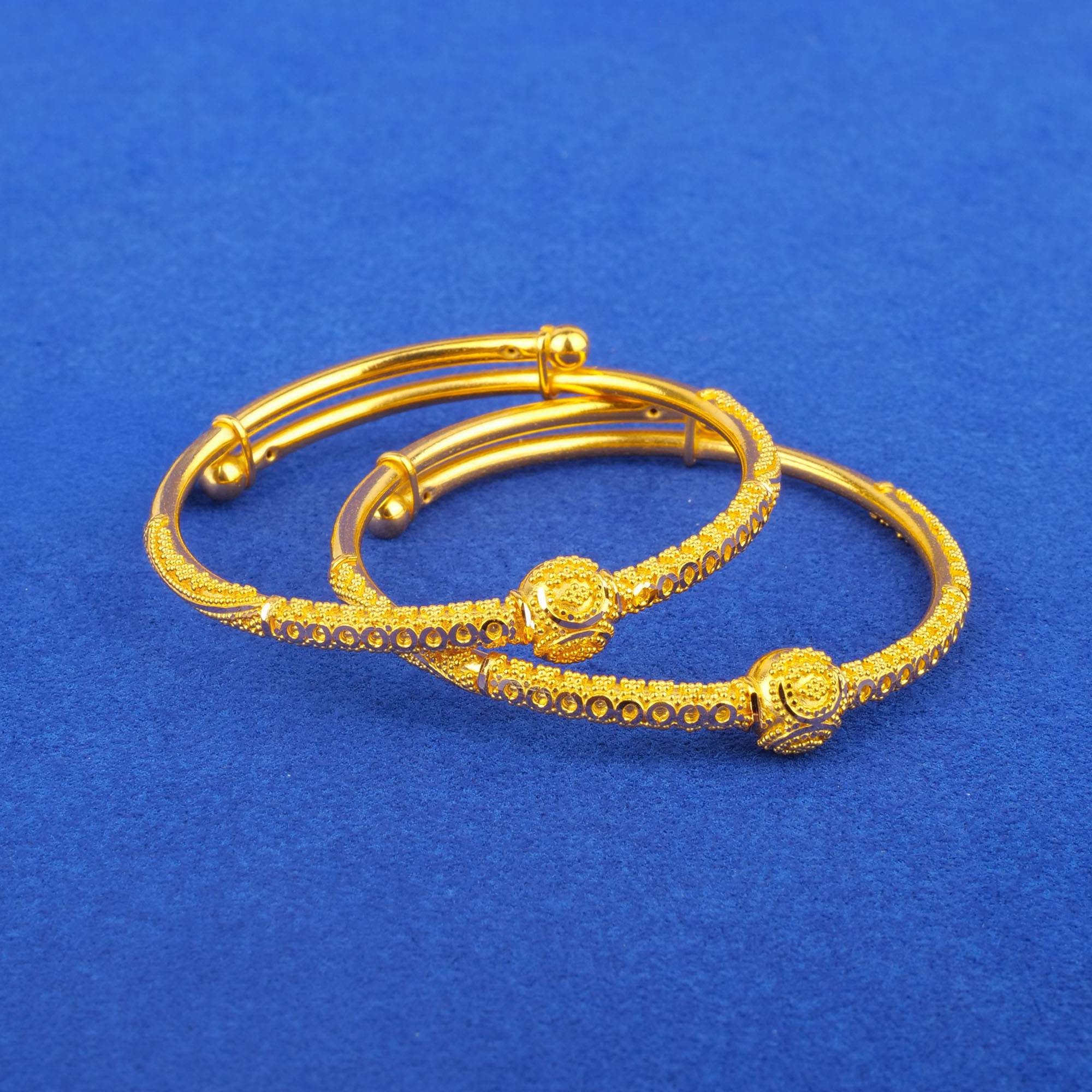 Twenty-Two Karat Baby Gold 'Adjustable' Bangles