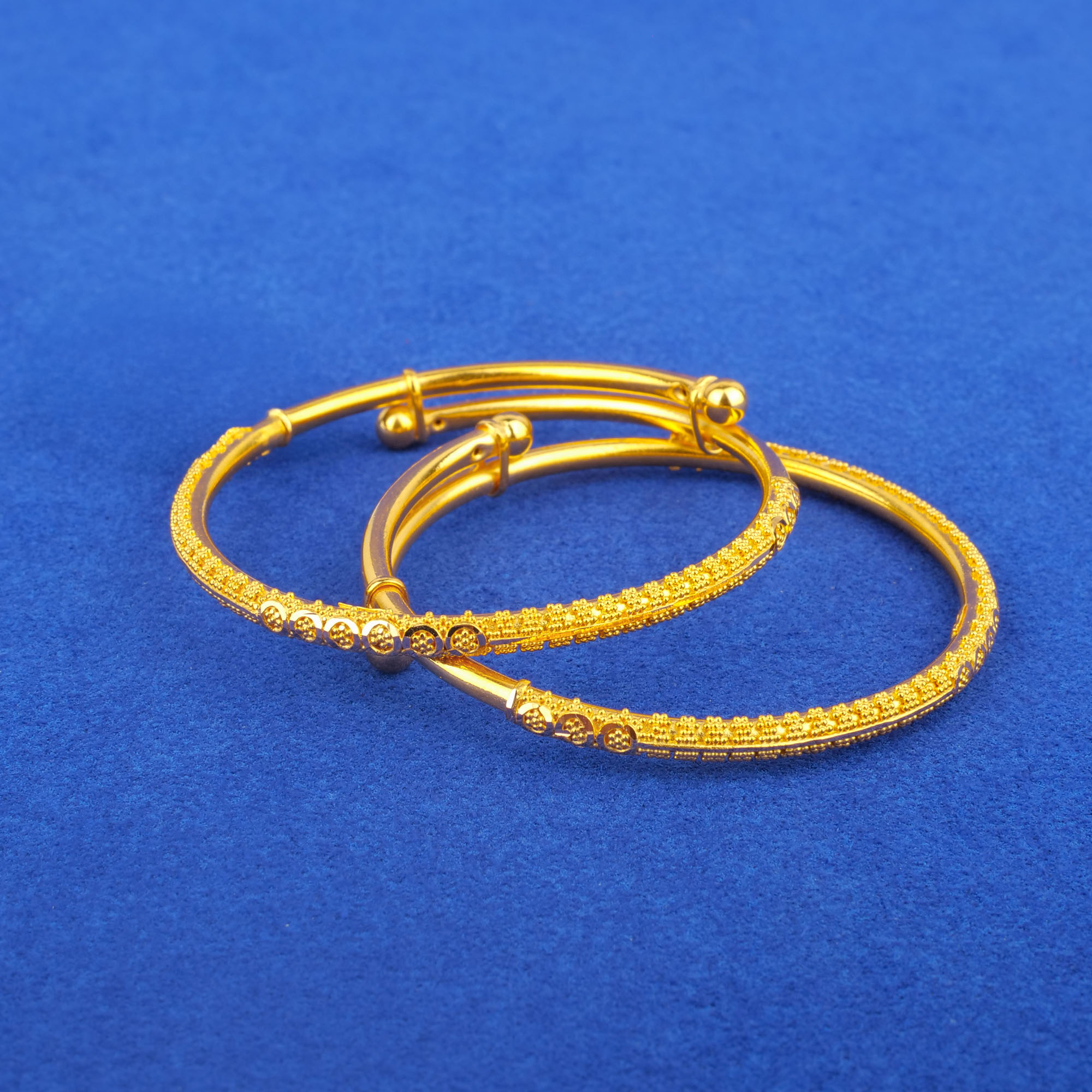 Twenty-Two Karat Baby Gold 'Adjustable' Bangles