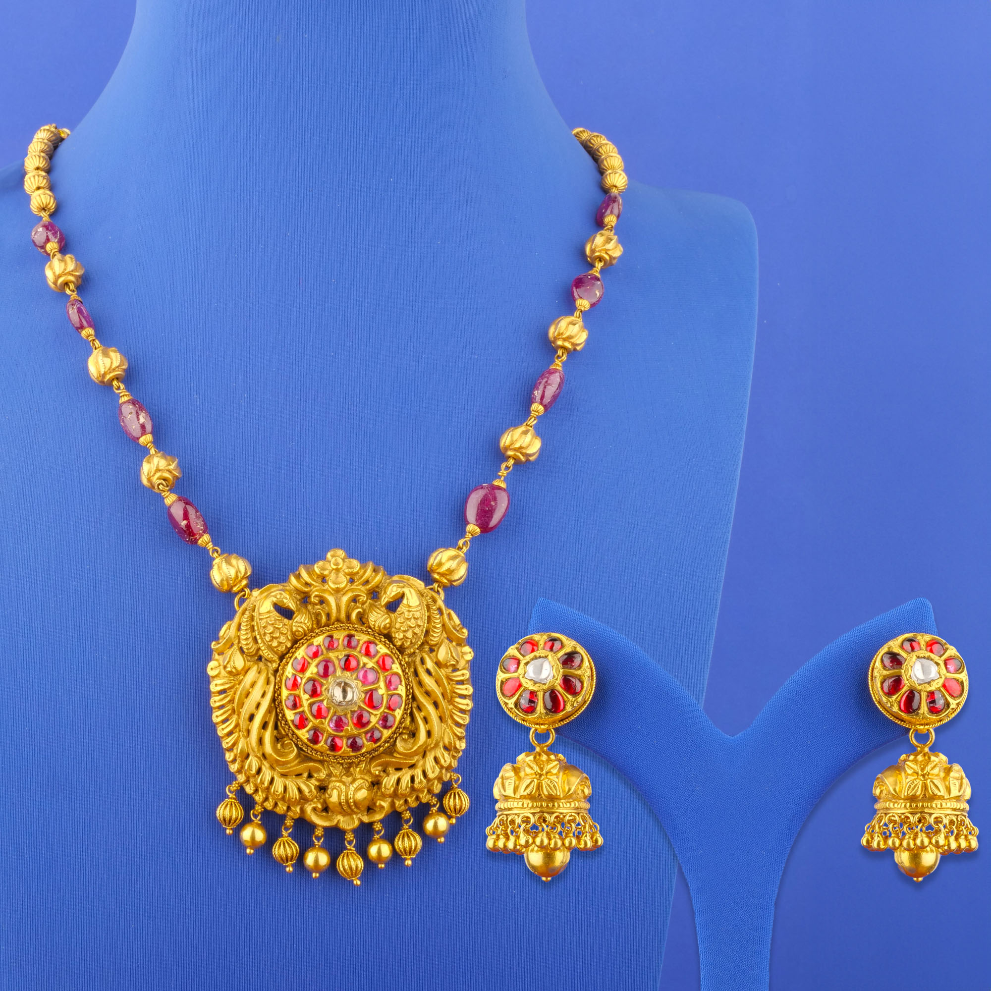 Twenty-Two Karat 'Antique' Polki Diamond Ruby Necklace and Earrings Set