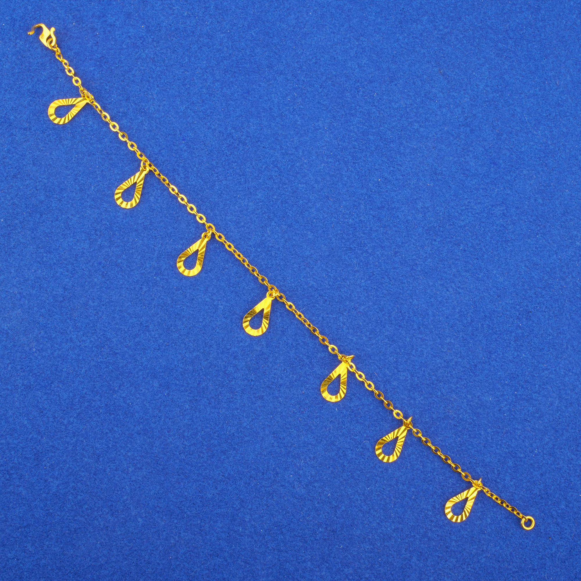 Twenty-Two Karat Gold 'Charm' Bracelet