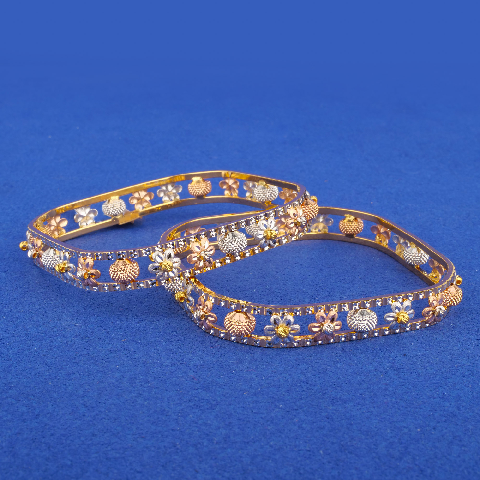 Twenty-Two Karat Tri-Color Gold Bangles