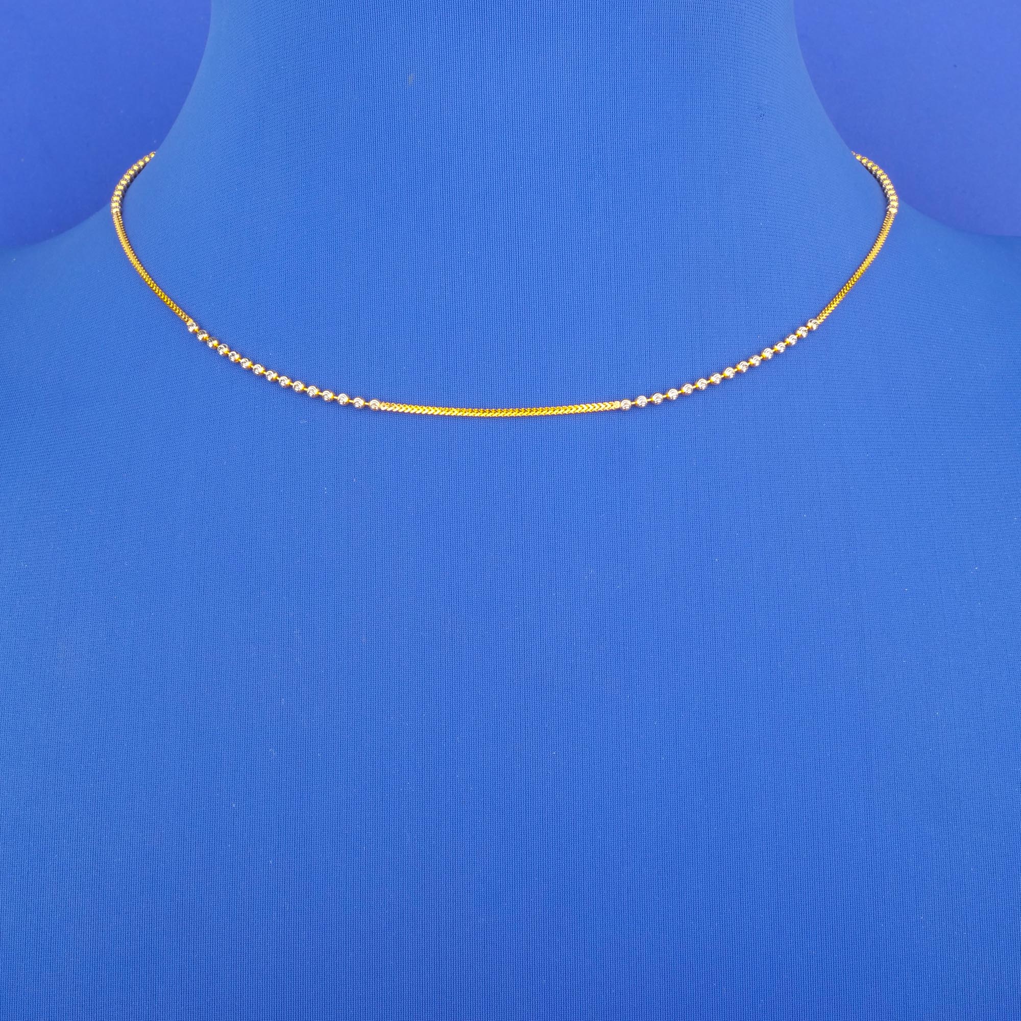 Twenty-Two Karat Two-Tone Gold Chain (b)