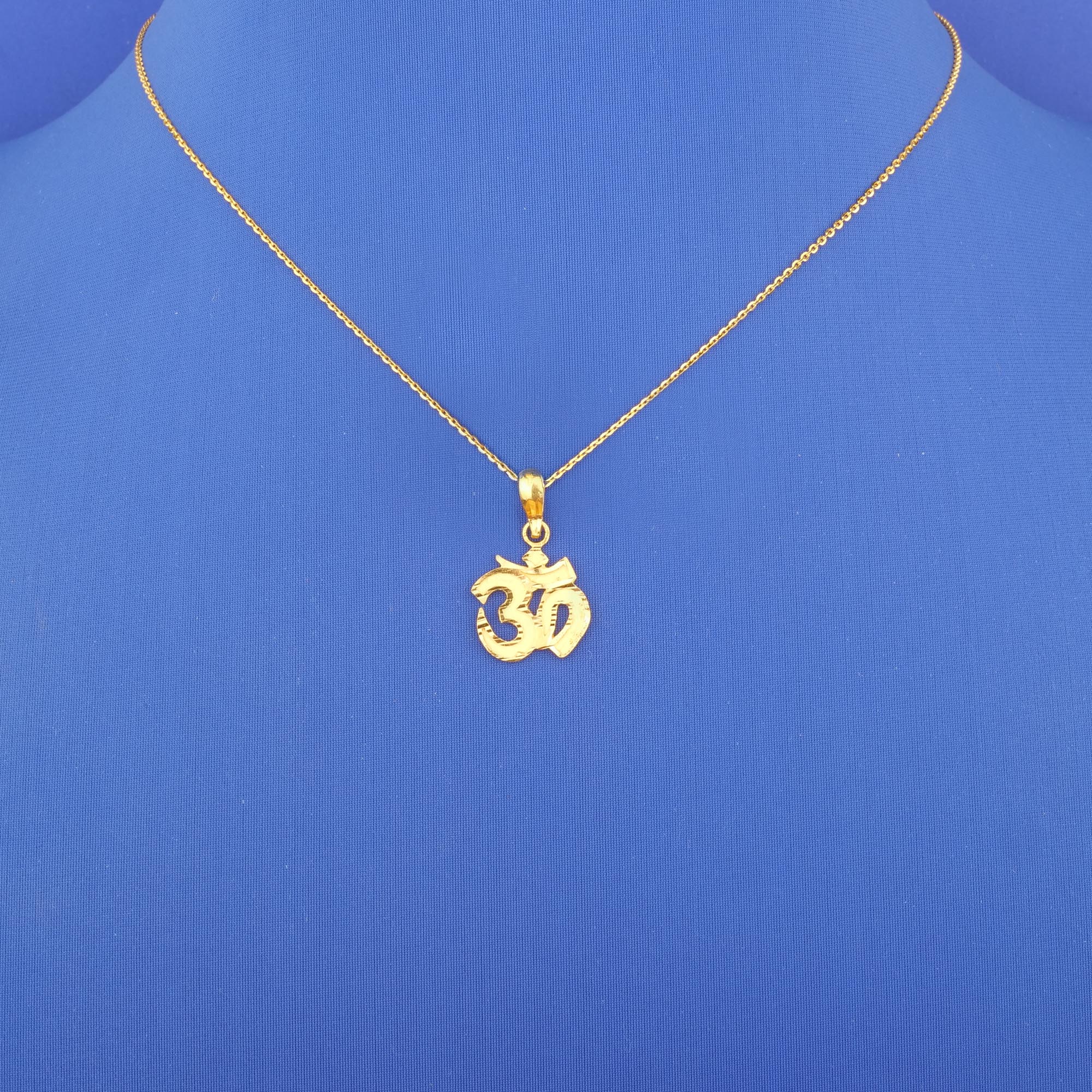 Twenty-Two Karat Gold 'Om' Pendant (chain not included)