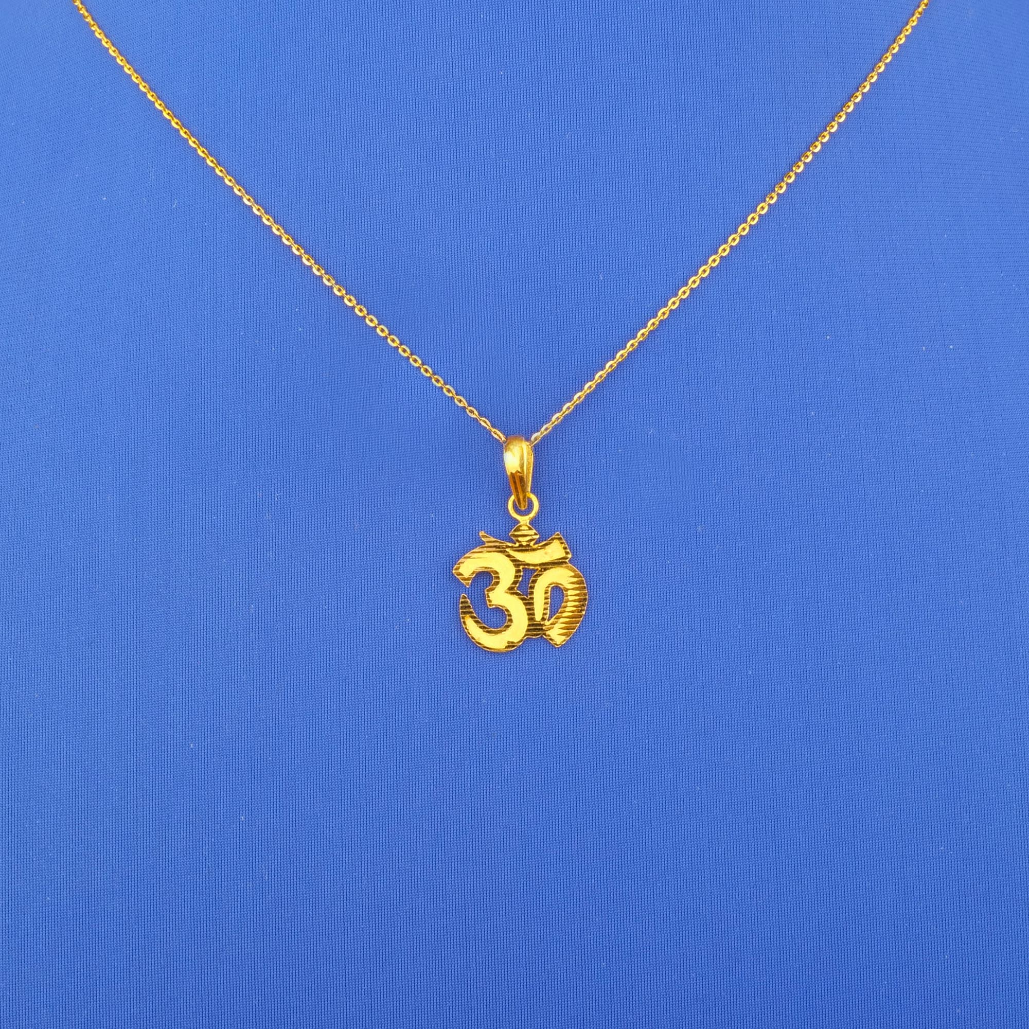 Twenty-Two Karat Gold 'Om' Pendant (chain not included)