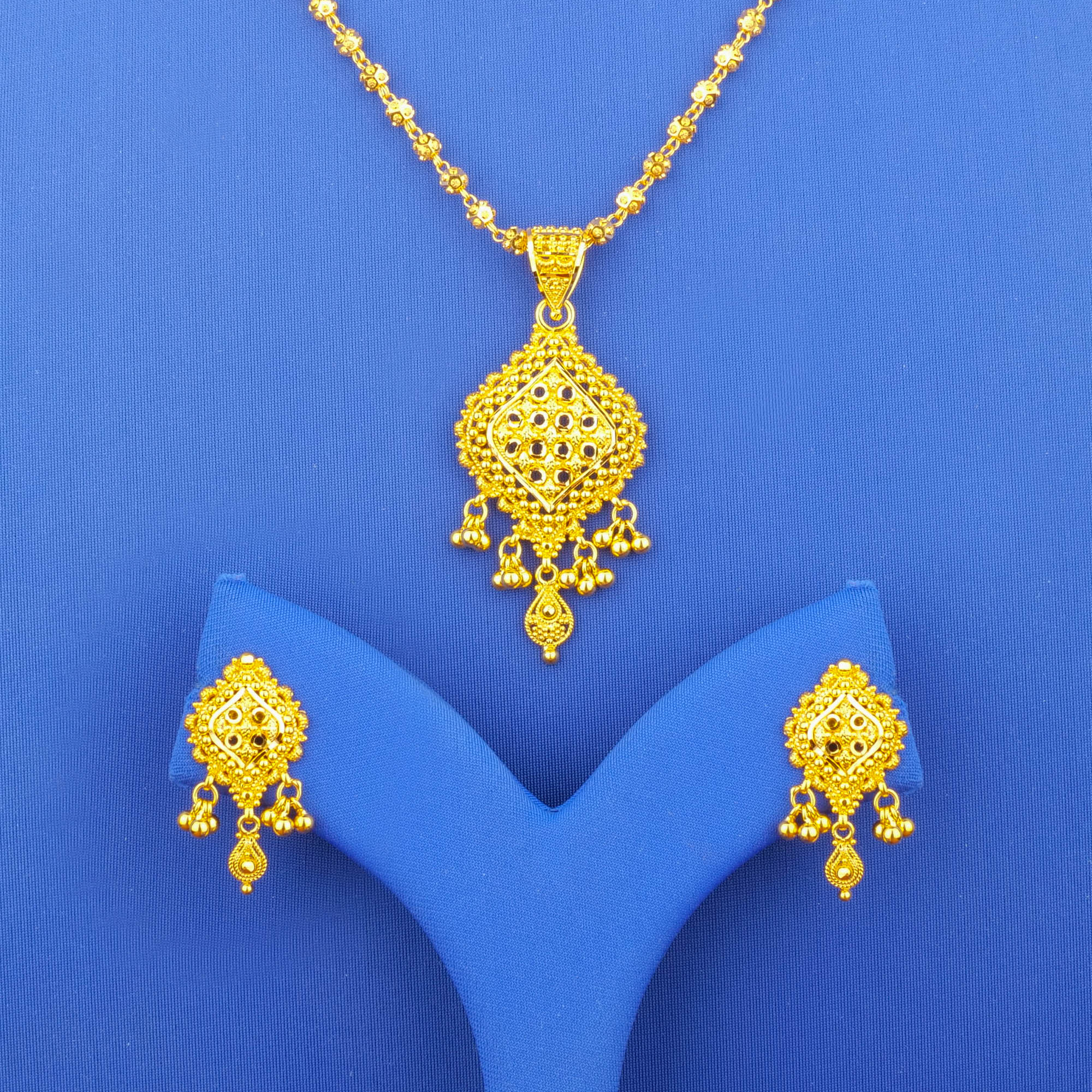 Twenty-Two Karat Gold Pendant and Earrings Set (chain not included)