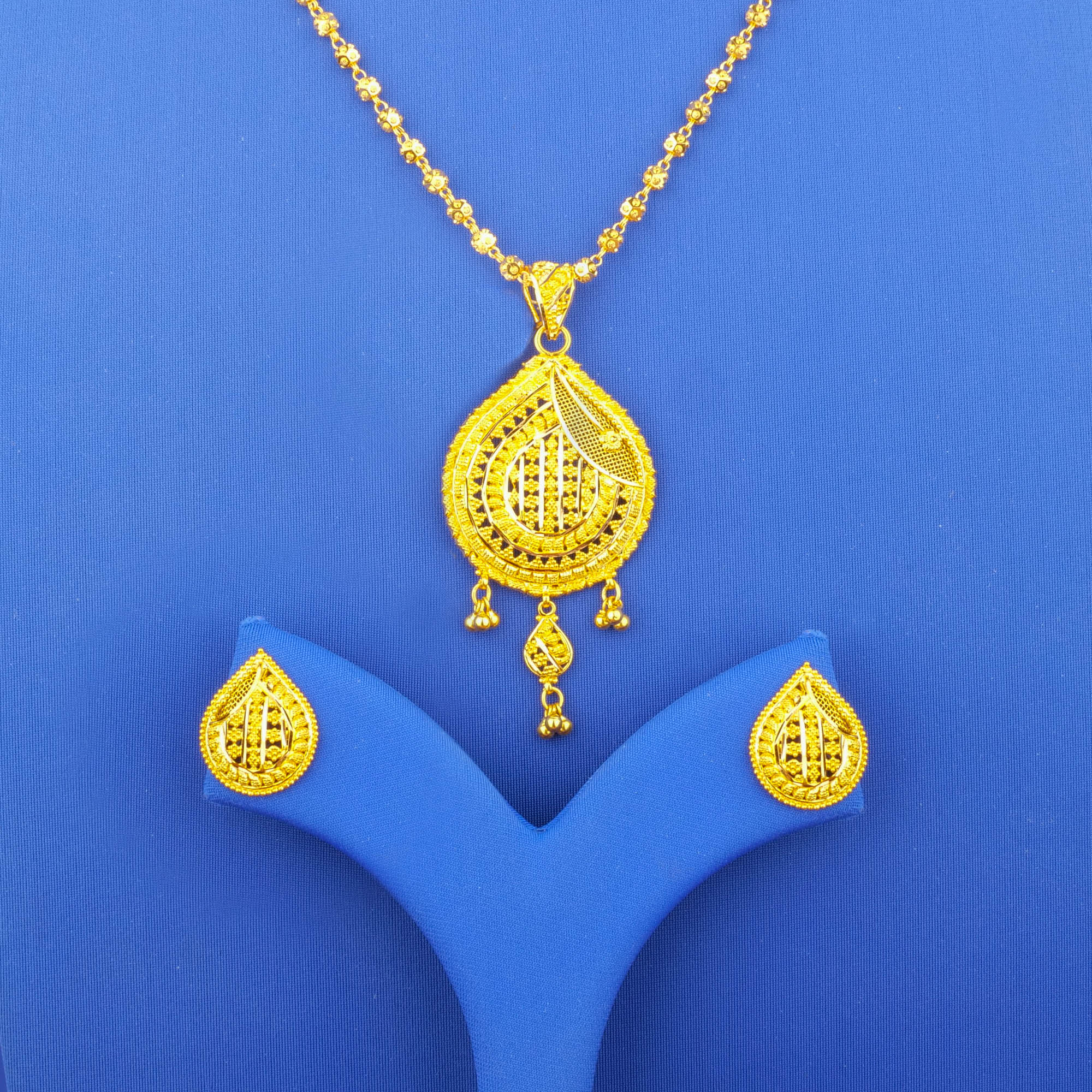 Twenty-Two Karat Gold Pendant and Earrings Set (chain not included)
