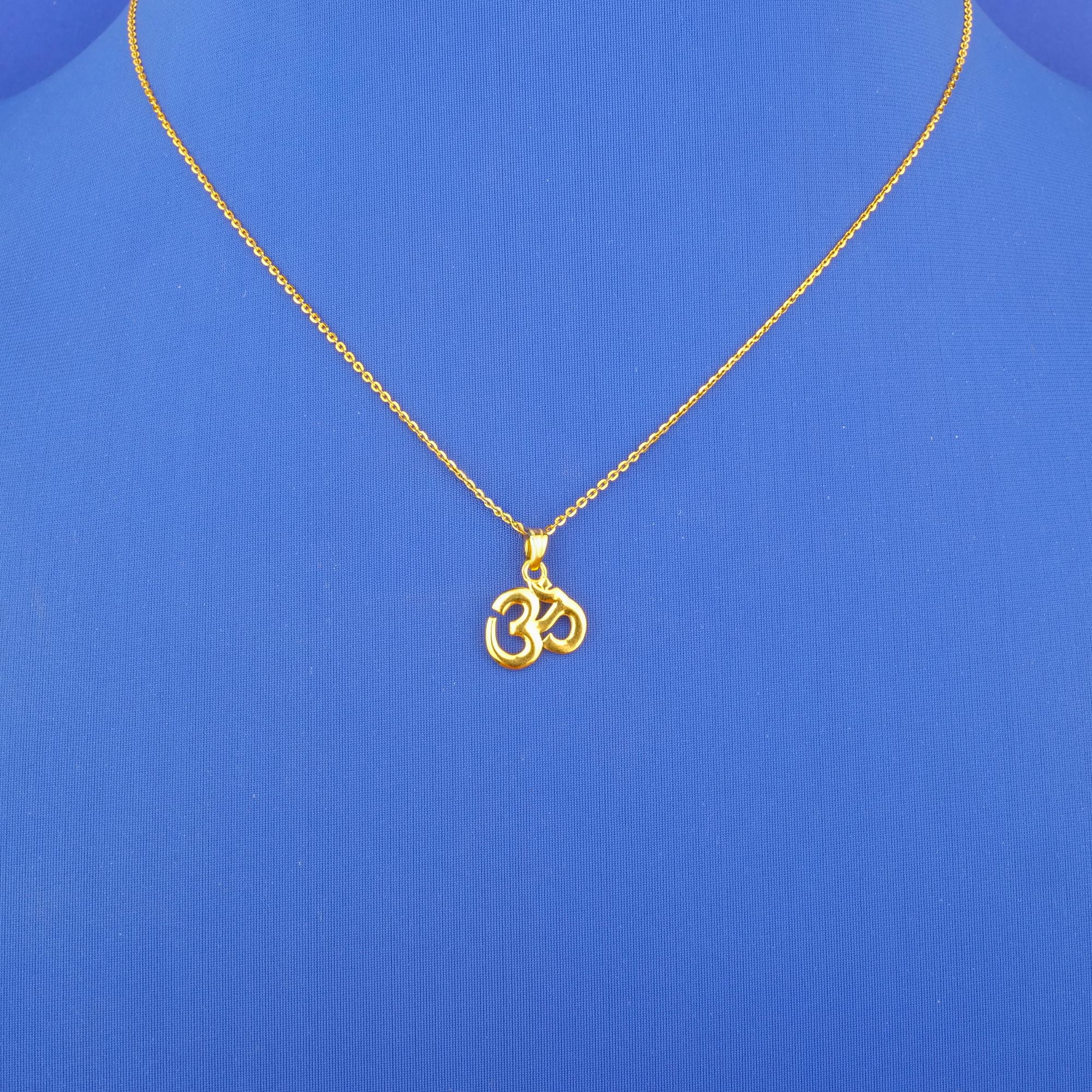 Twenty-Two Karat Gold 'Om' Pendant (chain not included)