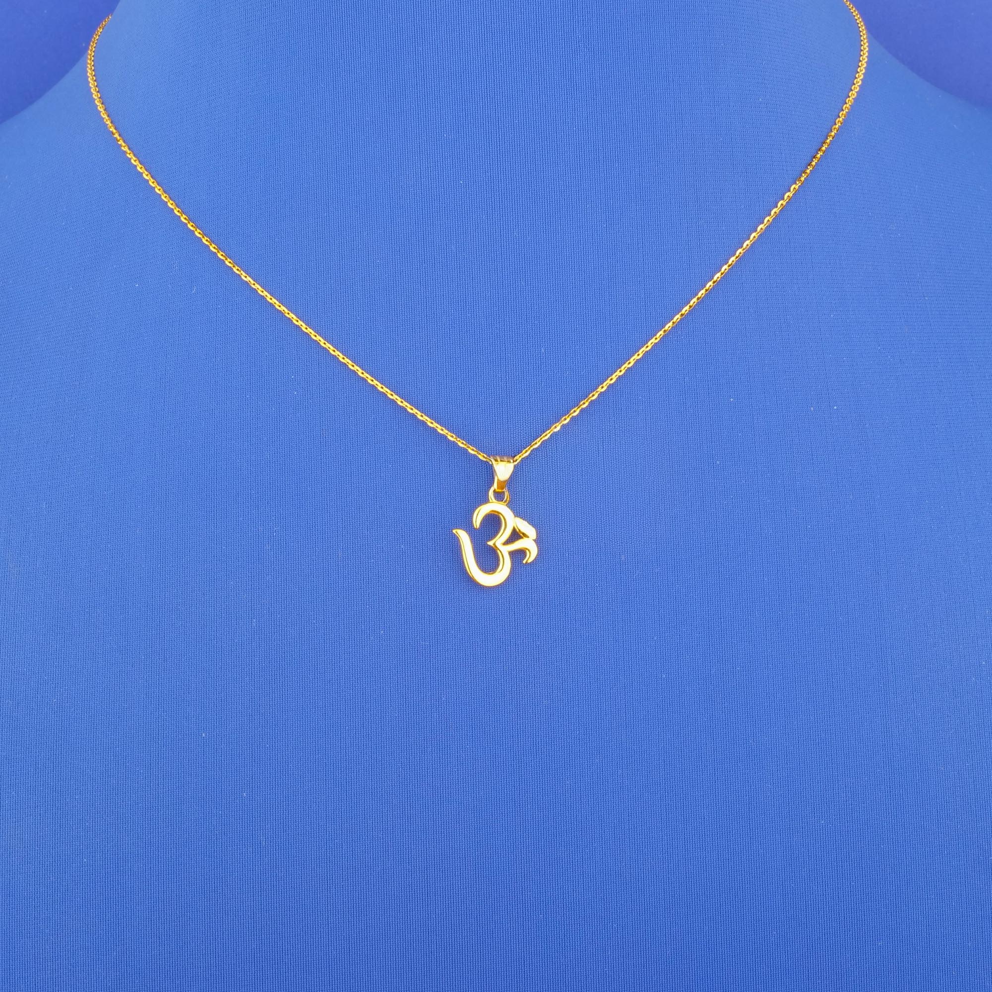 Twenty-Two Karat Gold 'Om' Pendant (chain not included)