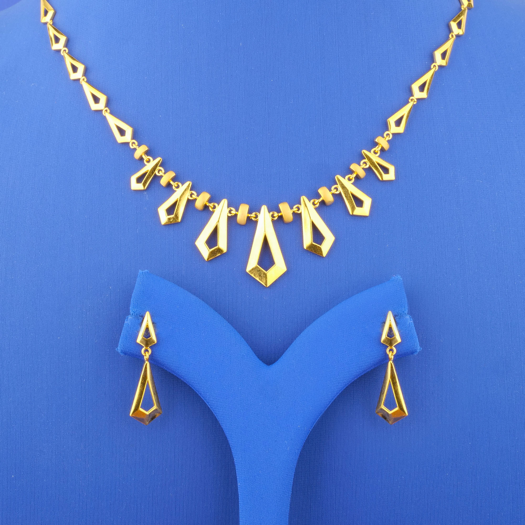 Twenty-Two Karat 'Fancy' Gold Necklace and Earrings Set