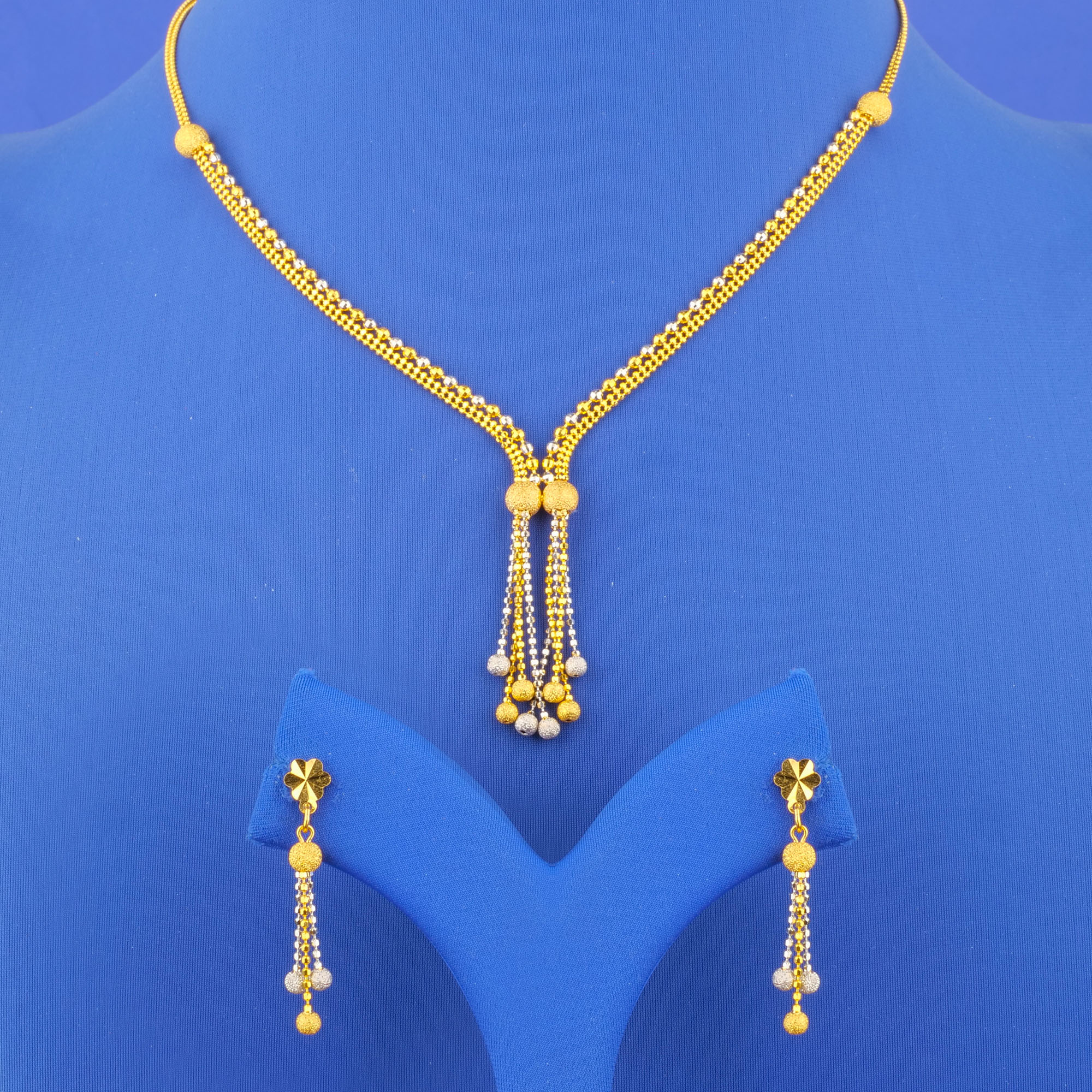 Twenty-Two Karat Two-Tone Gold Necklace and Earrings Set