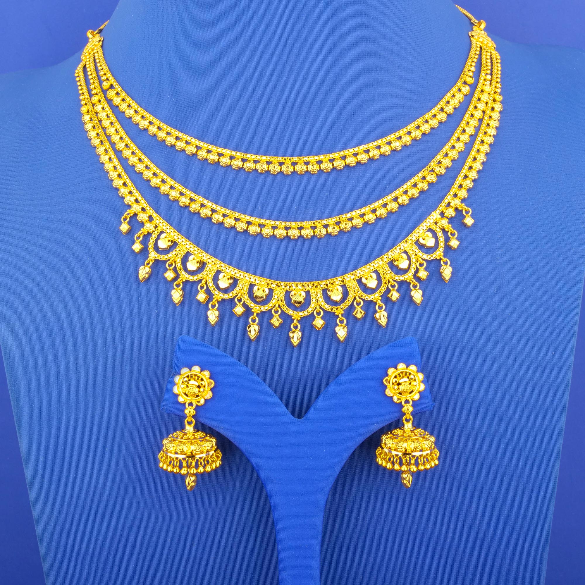 Twenty-Two Karat Gold 'Layered' Necklace and Earrings Set