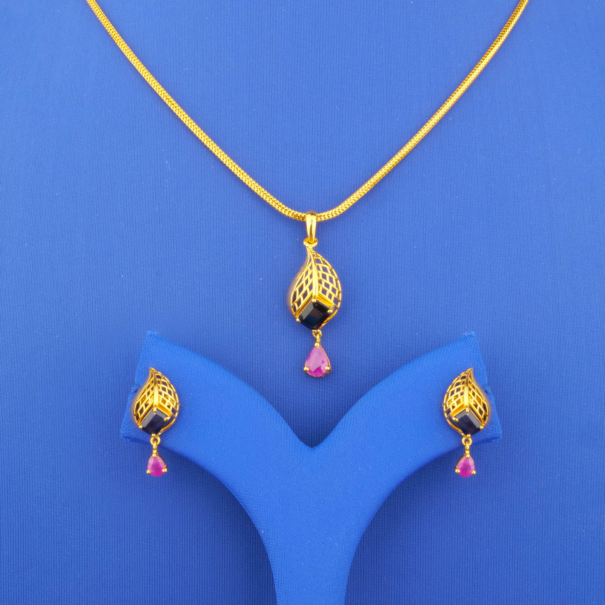 Twenty-Two Karat Gold Ruby Sapphire Pendant and Earrings Set (chain not included)