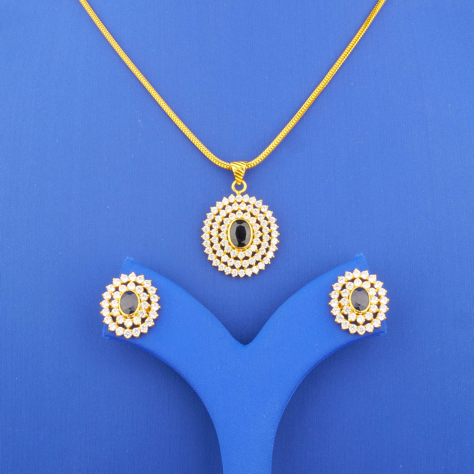 Twenty-Two Karat Gold Sapphire Cubic Zirconia Pendant and Earrings Set (chain not included)