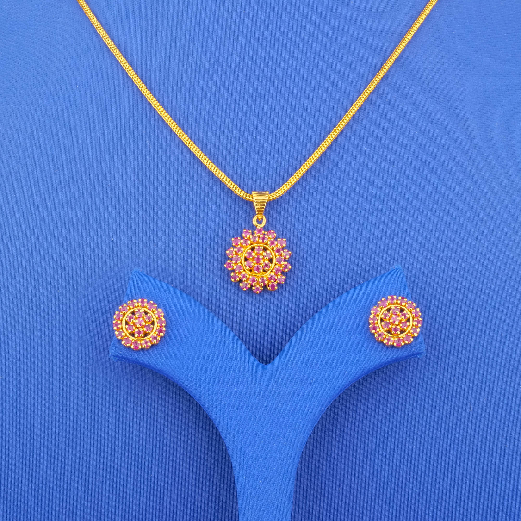 Twenty-Two Karat Gold Ruby Pendant and Earrings Set (chain not included)