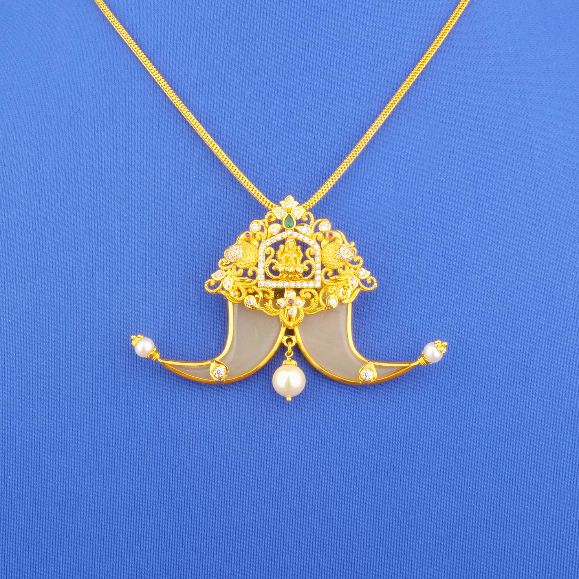 Twenty-Two Karat Gold Ruby Emerald Cubic Zirconia Pearl 'Tigernail' Pendant