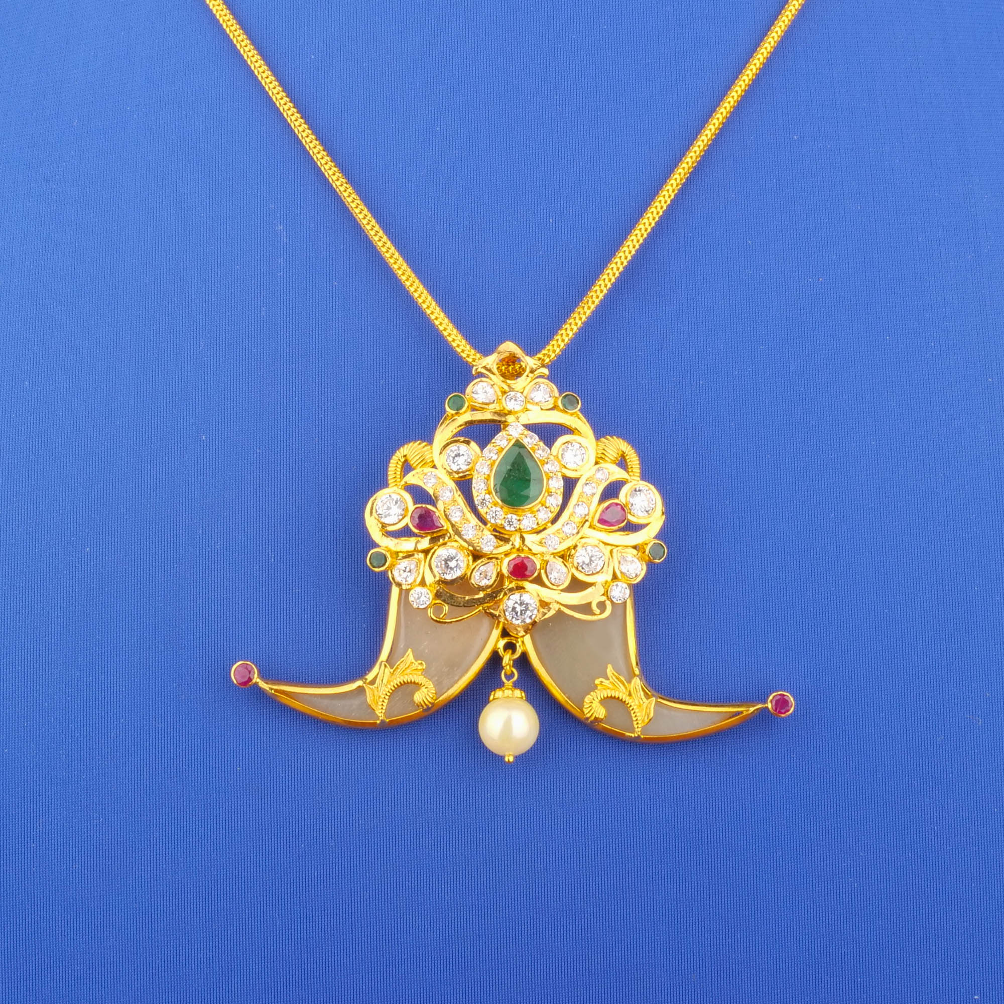 Twenty-Two Karat Gold Ruby Emerald Cubic Zirconia Pearl 'Tigernail' Pendant