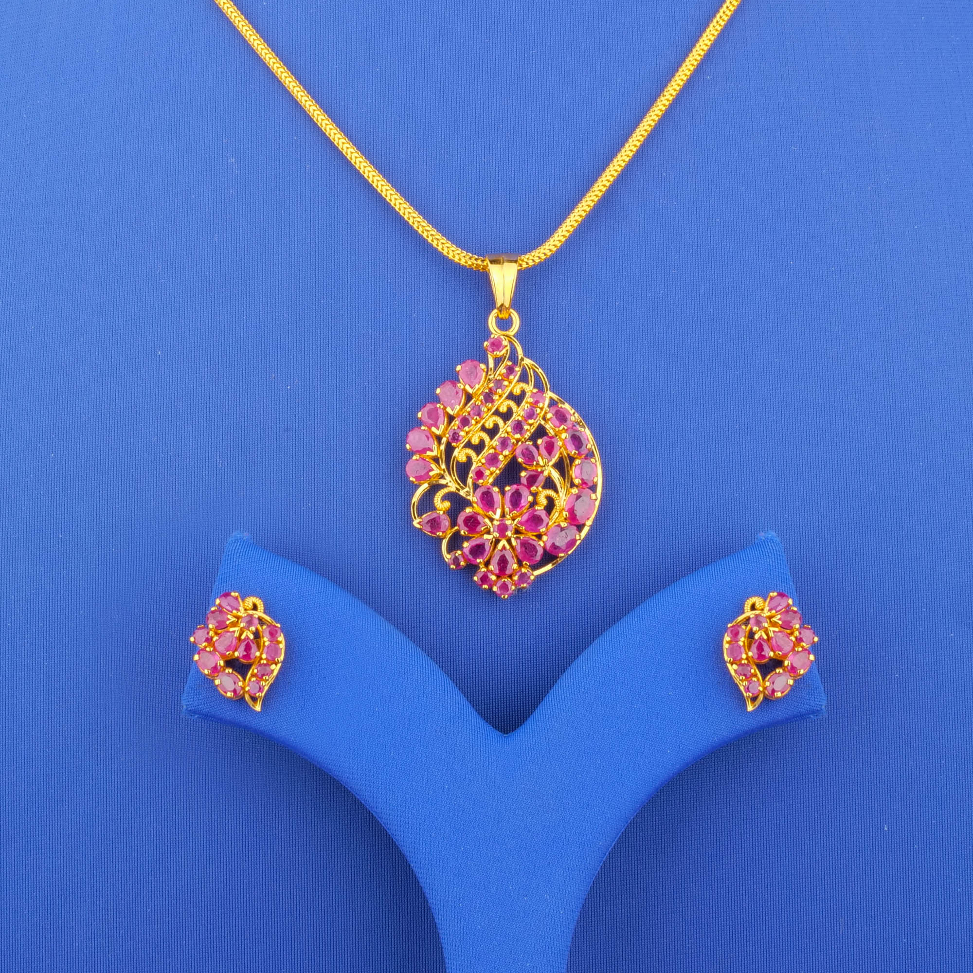 Twenty-Two Karat Gold Ruby Pendant Earring Set (chain not included)