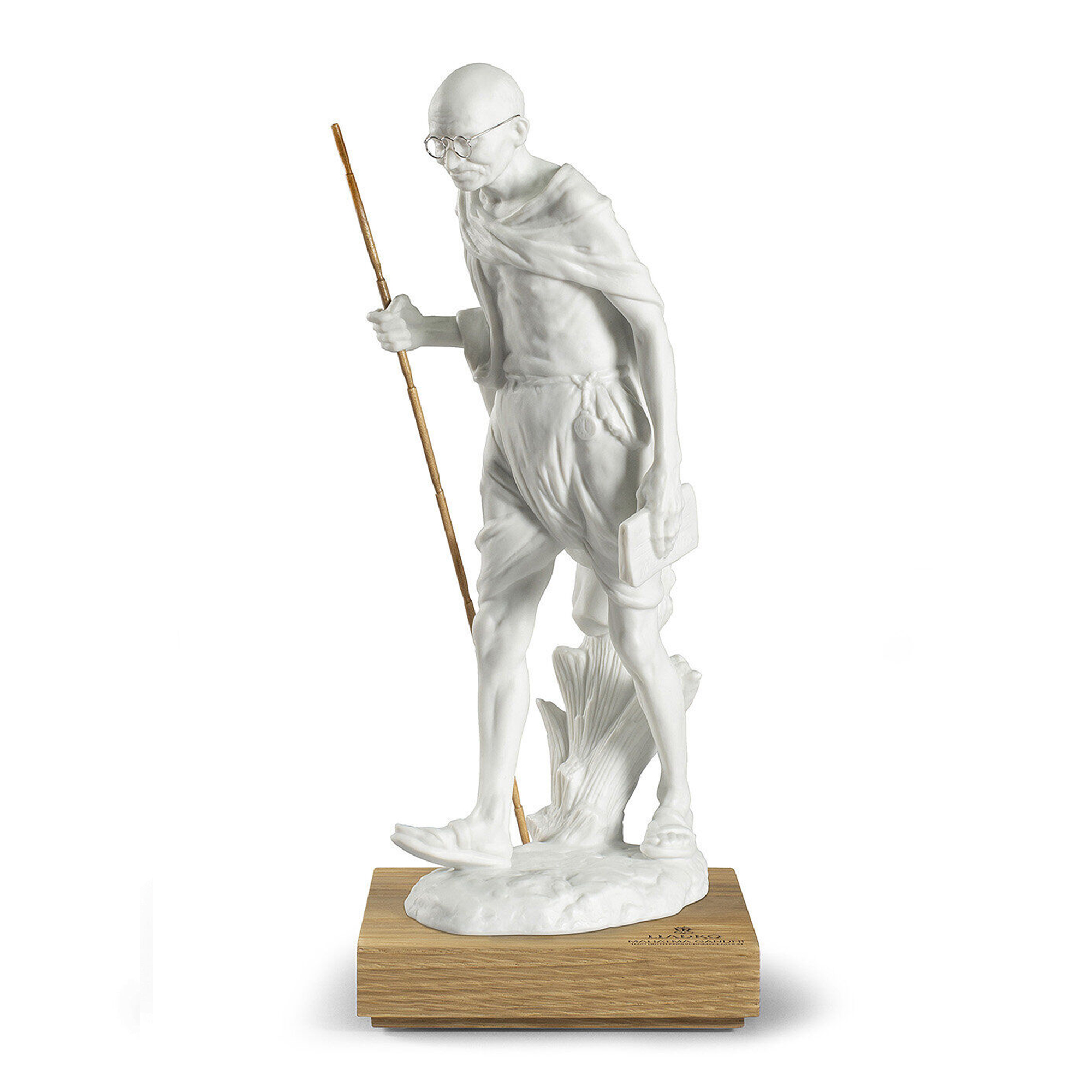 Mahatma Gandhi Figurine. White. This porcelain figurine is a faithful portrayal of the great politician and philosopher known as the father of India.