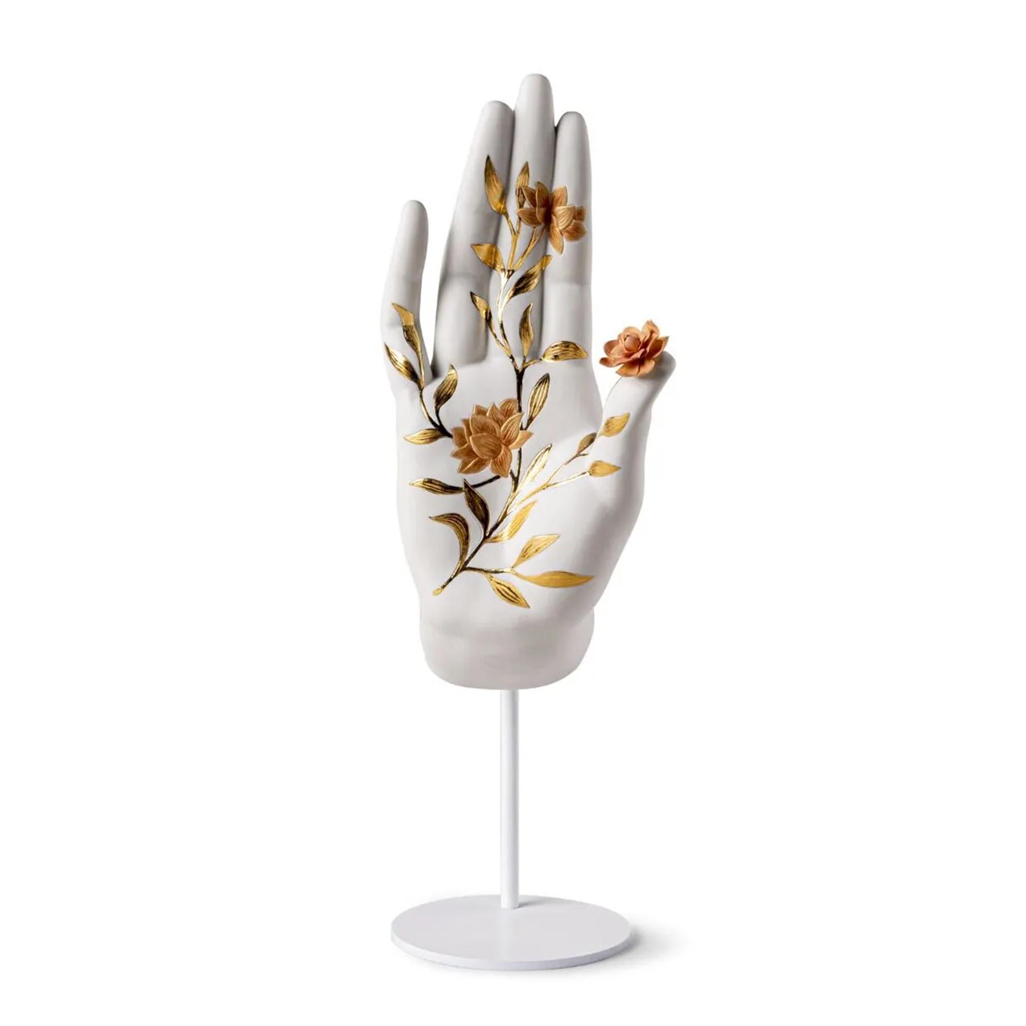 Protection Mudra Sculpture Made in matte white porcelain and decorated with golden luster, this hand represents a mudra, a symbolic and spiritual gesture.