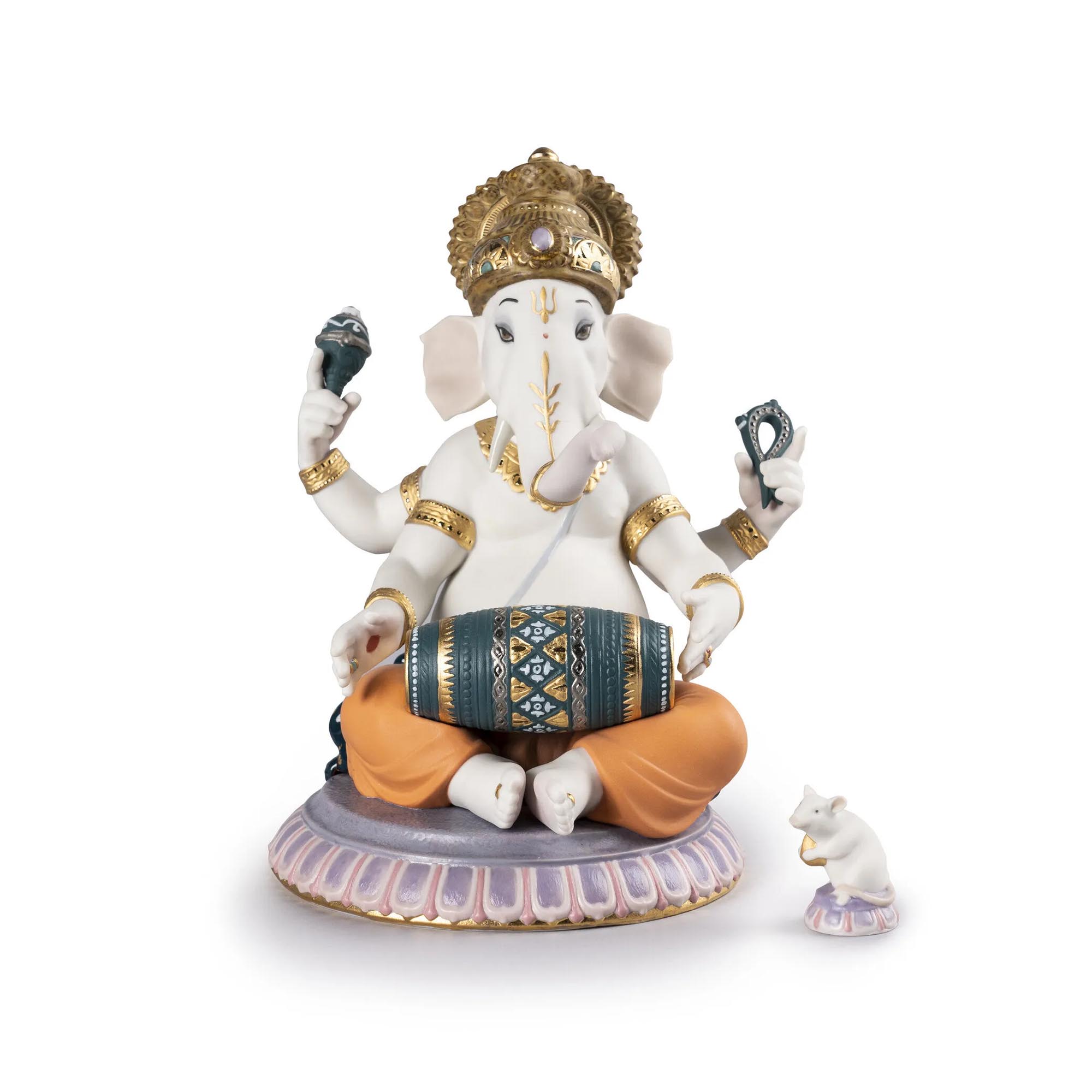 Mridangam Ganesha Figurine. Limited Edition Porcelain figurine of the Hindu god Lord Ganesha, with a human body and the head of an elephant, playing a mridangam instrument. Limited edition.