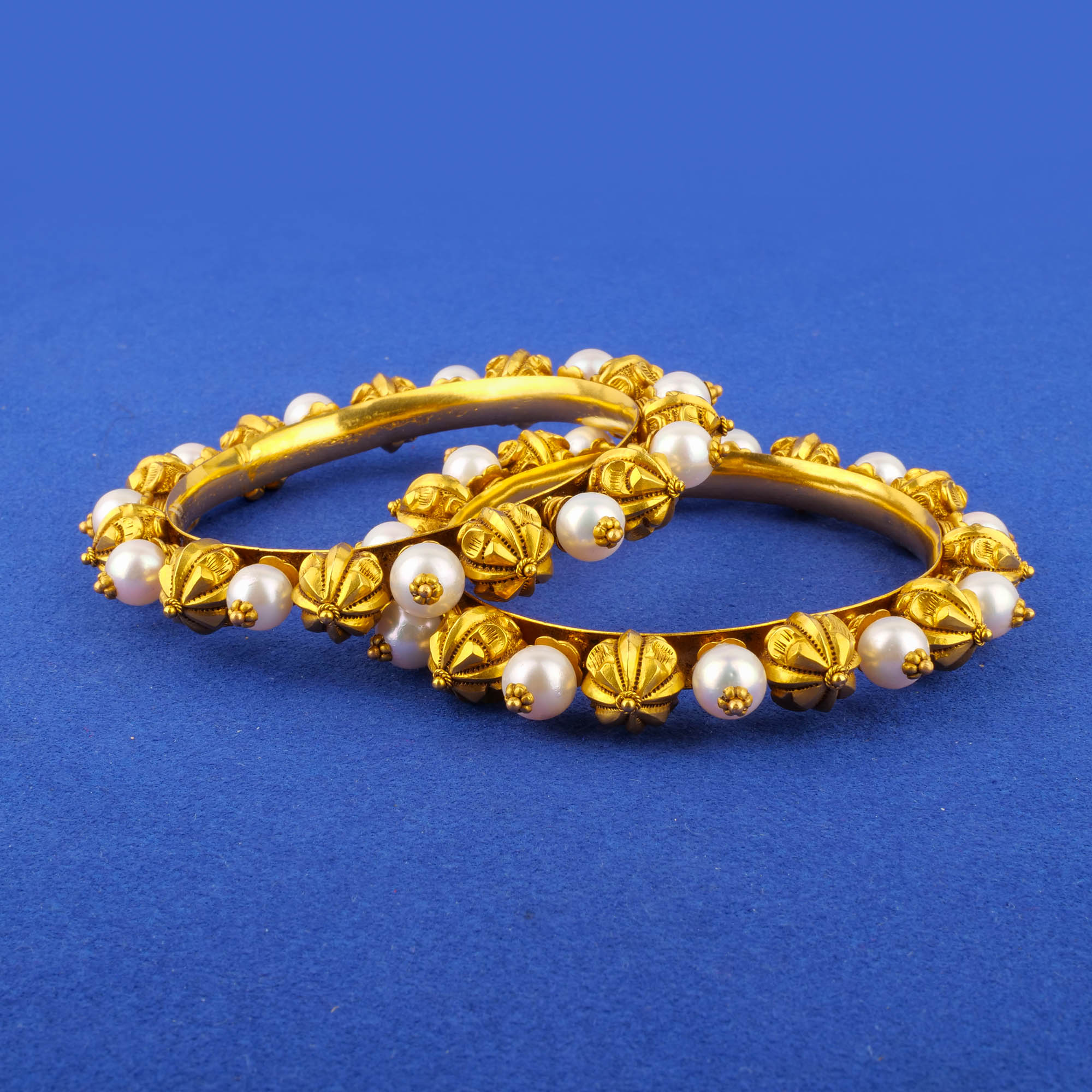 Twenty-Two Karat 'Antique' Pearl Bangles