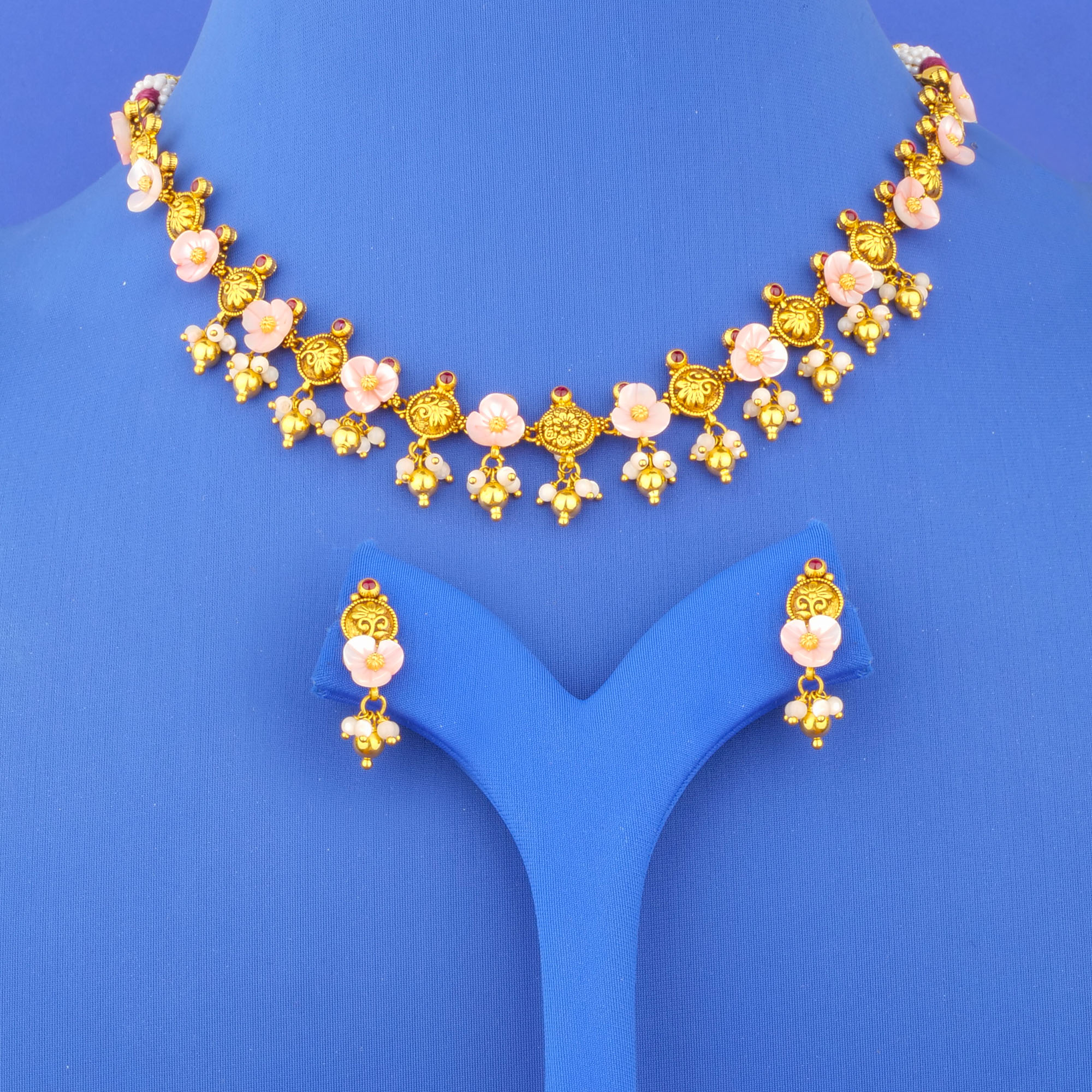 Twenty-Two Karat 'Antique' Mother of Pearl Necklace and Earrings Set