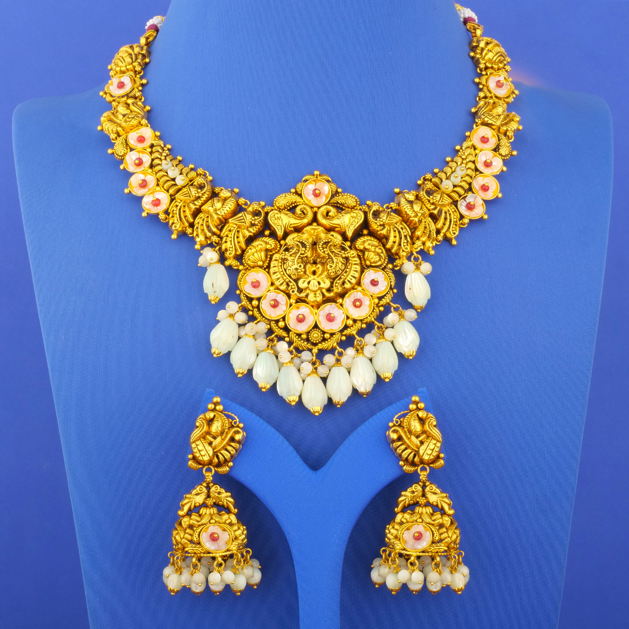 Twenty-Two Karat 'Antique' Mother of Pearl Jade Pearl Necklace and Earrings Set