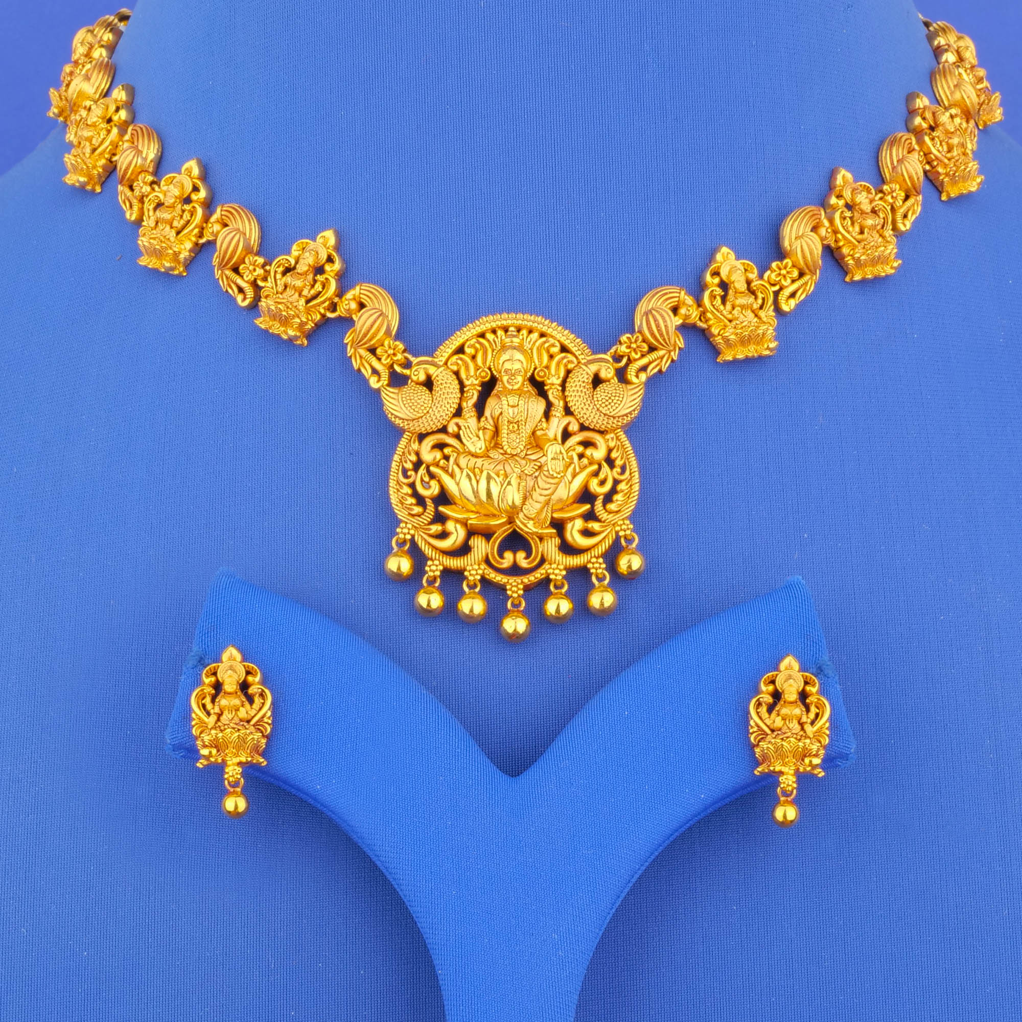 Twenty-Two Karat 'Antique' Lakshmi Necklace and Earrings Set