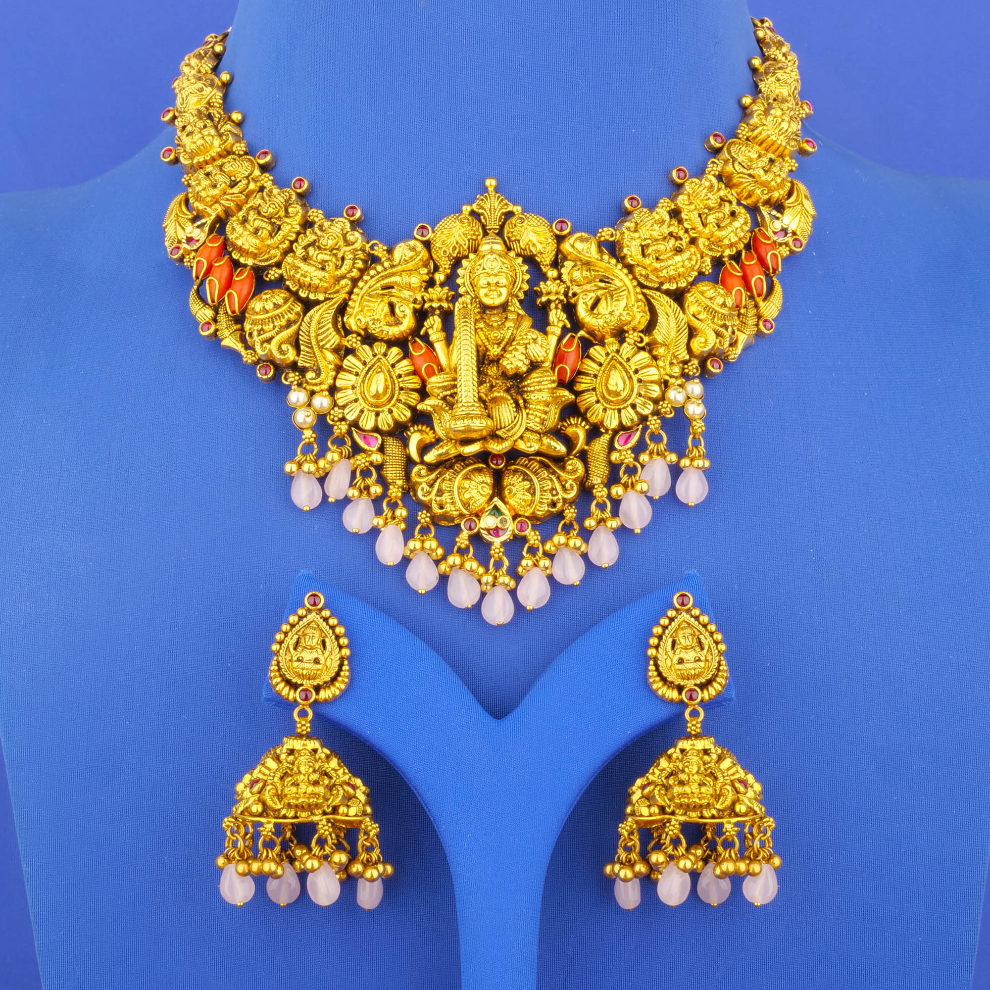 Twenty-Two Karat 'Antique' Lakshmi Coral Necklace and Earrings Set