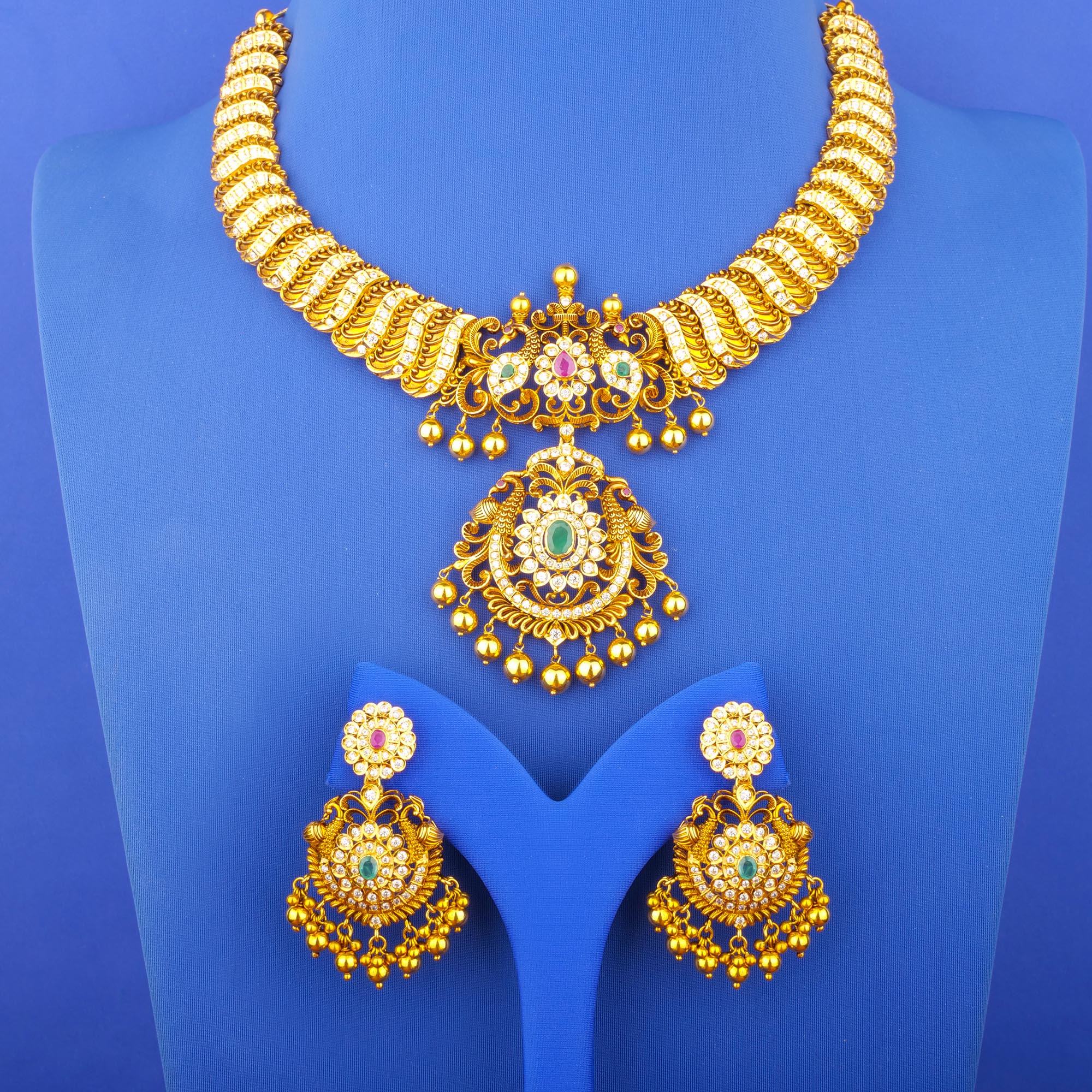 Twenty-Two Karat 'Antique' Ruby Emerald Cubic Zirconia Necklace and Earrings Set