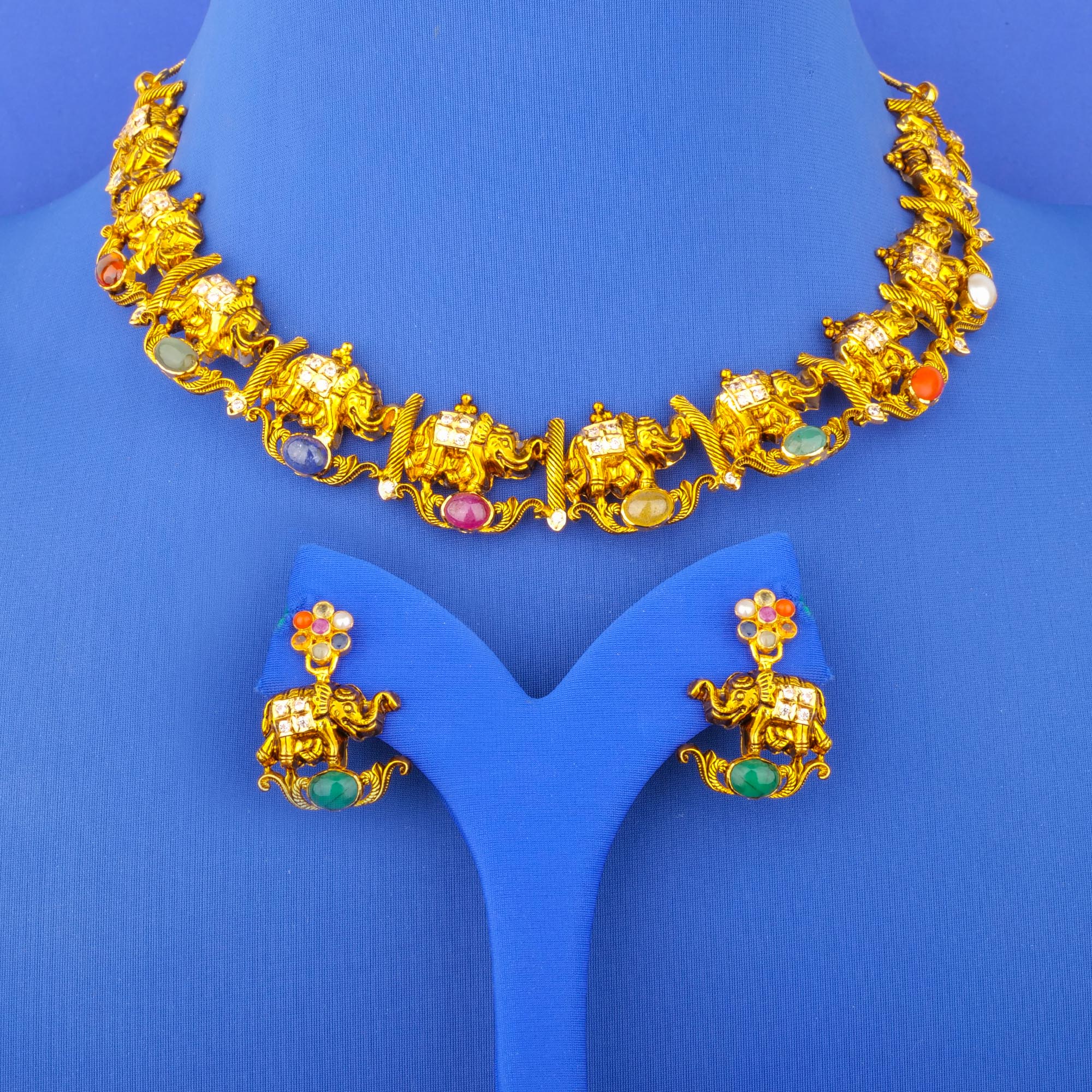 Twenty-Two Karat 'Antique' Navratna Cubic Zirconia Necklace and Earrings Set