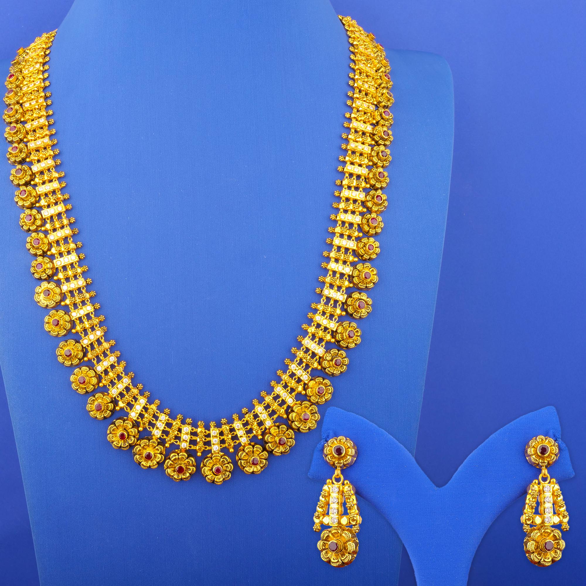 Twenty-Two Karat 'Antique' Ruby Cubic Zirconia Necklace and Earrings Set