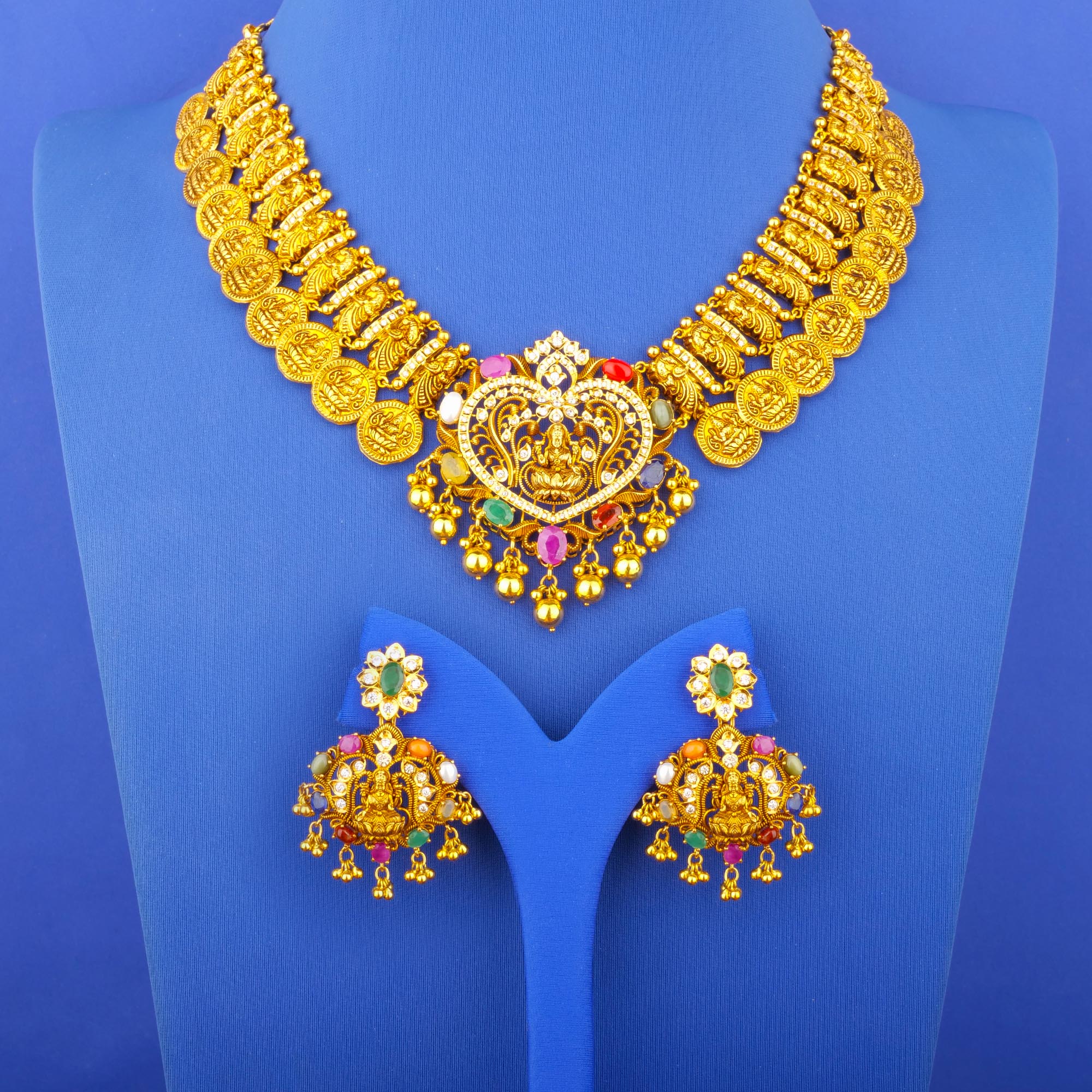Twenty-Two Karat 'Antique' Navratna Cubic Zirconia Necklace and Earrings Set