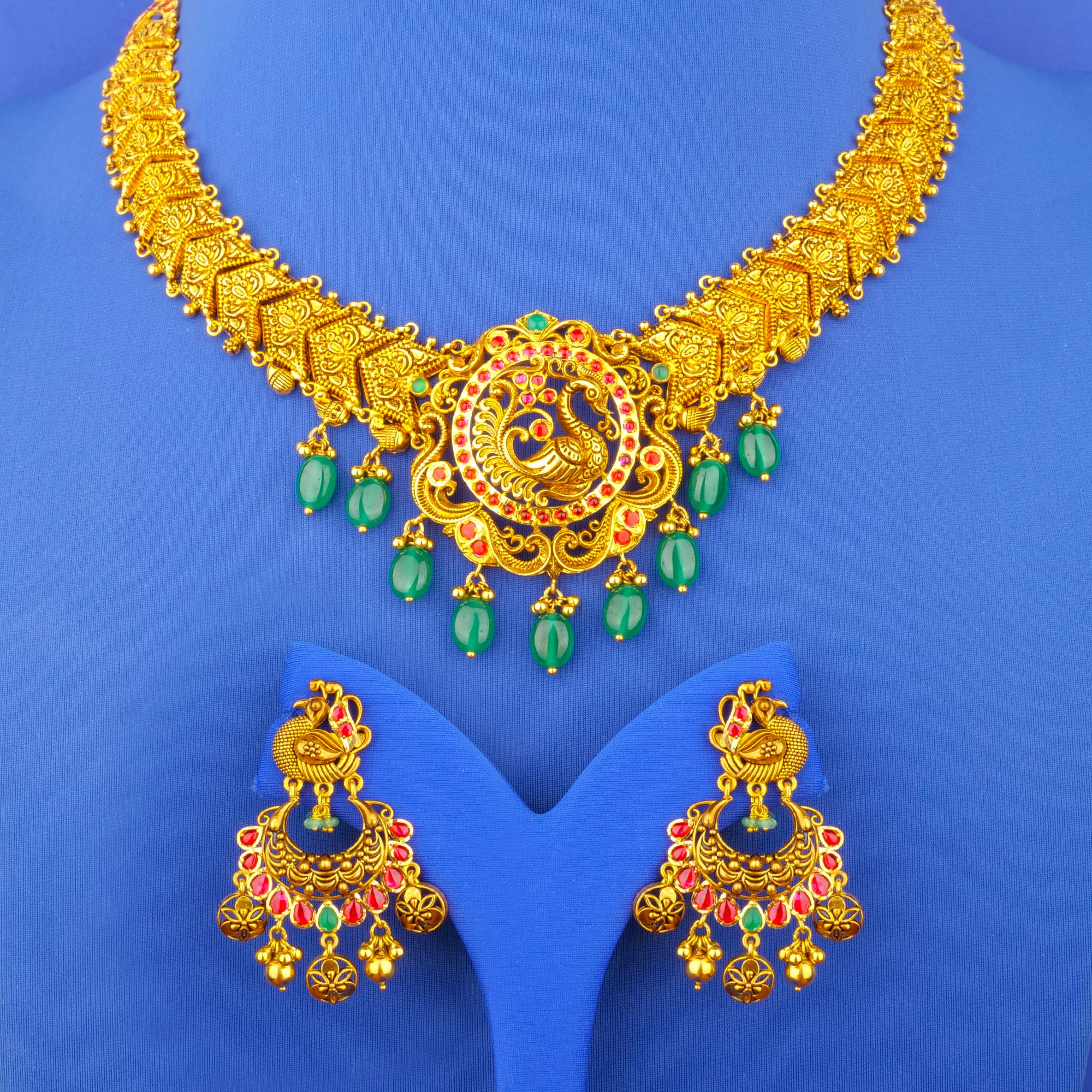 Twenty-Two Karat 'Antique' Kundan Ruby Emerald Necklace and Earrings Set